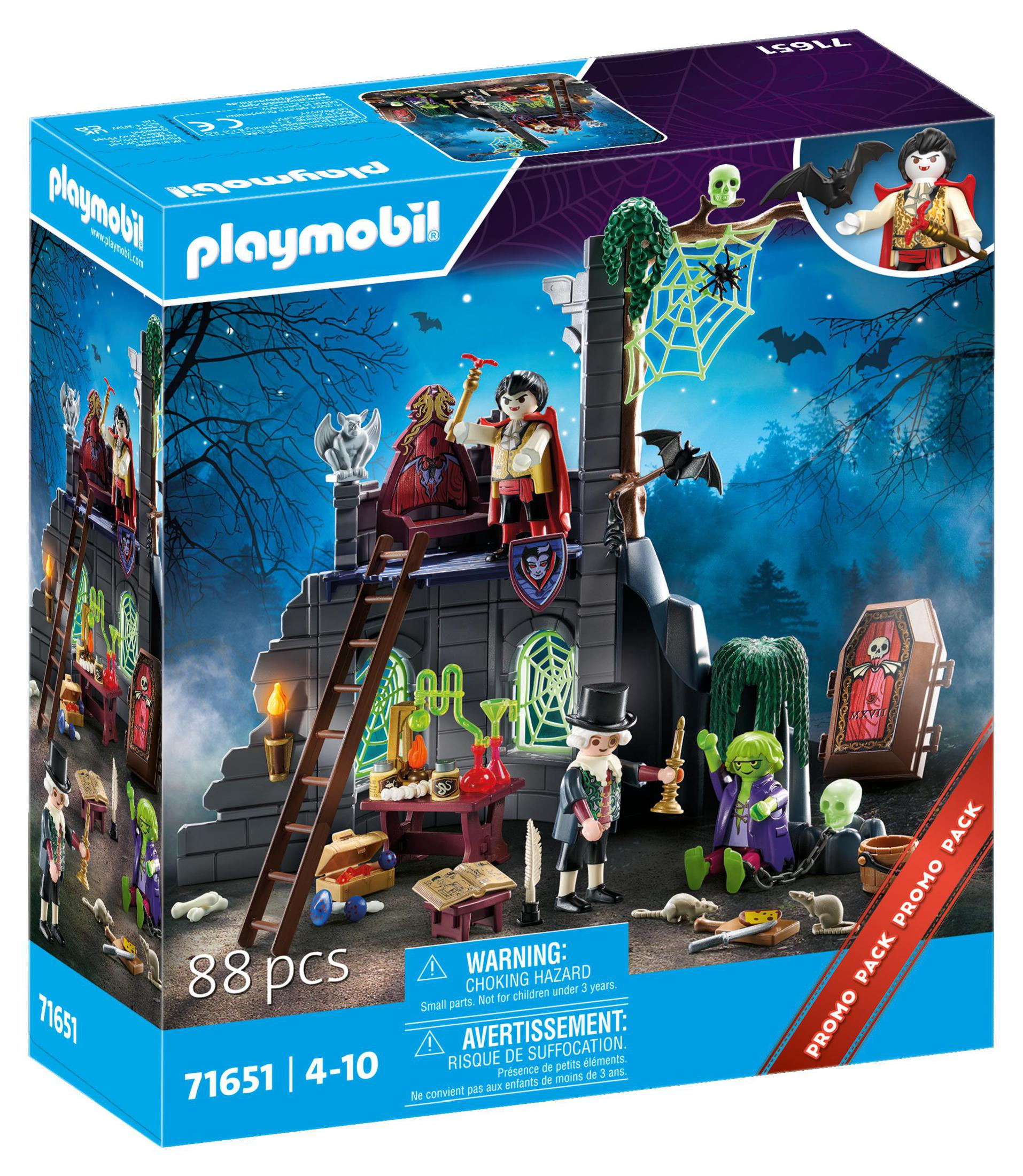 Zestaw zamku wampirów Playmobil z figurkami i akcesoriami, ciemne tło i upiorna atmosfera.
