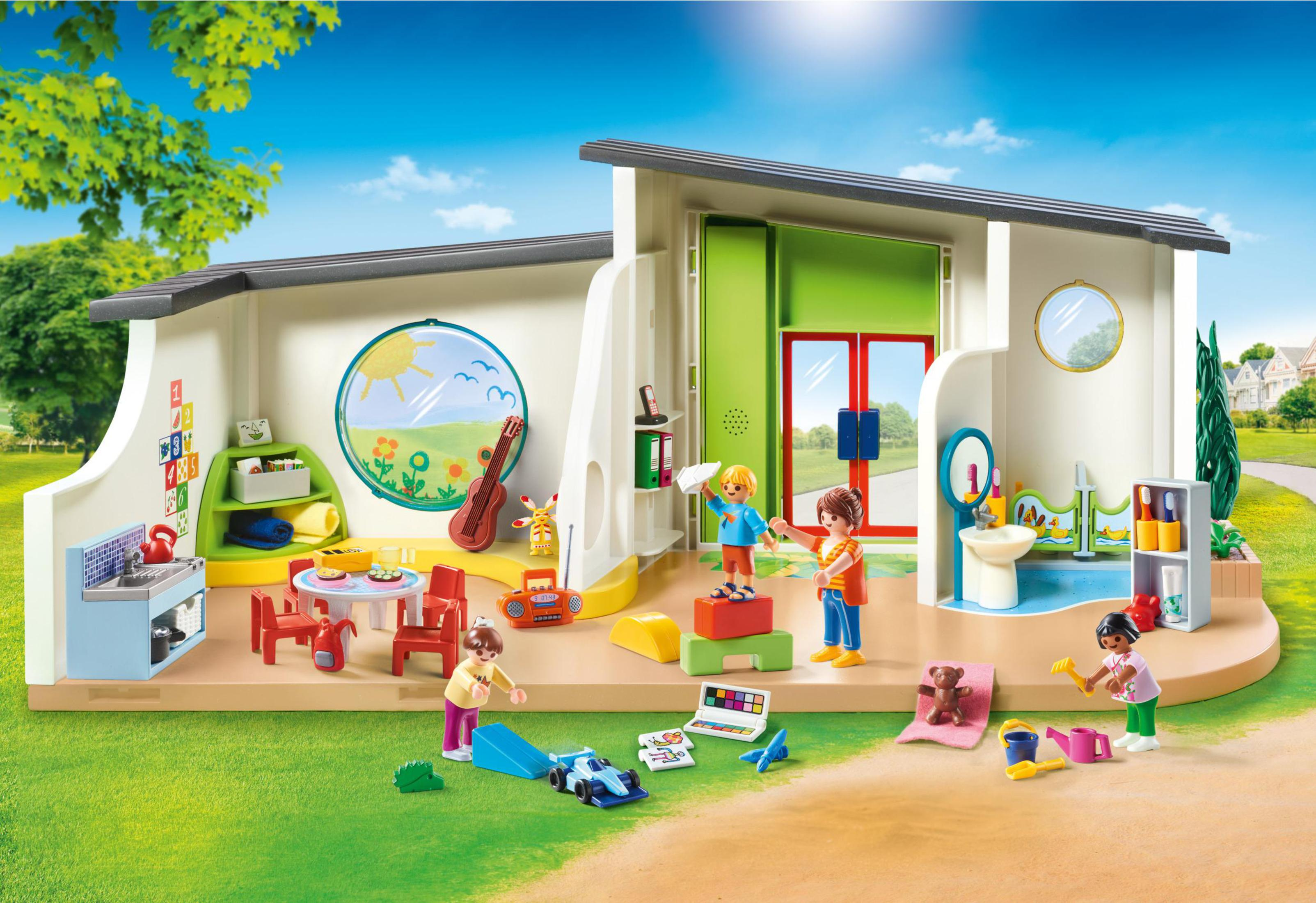 Set di gioco prescolare Playmobil con bambini che giocano all'interno.