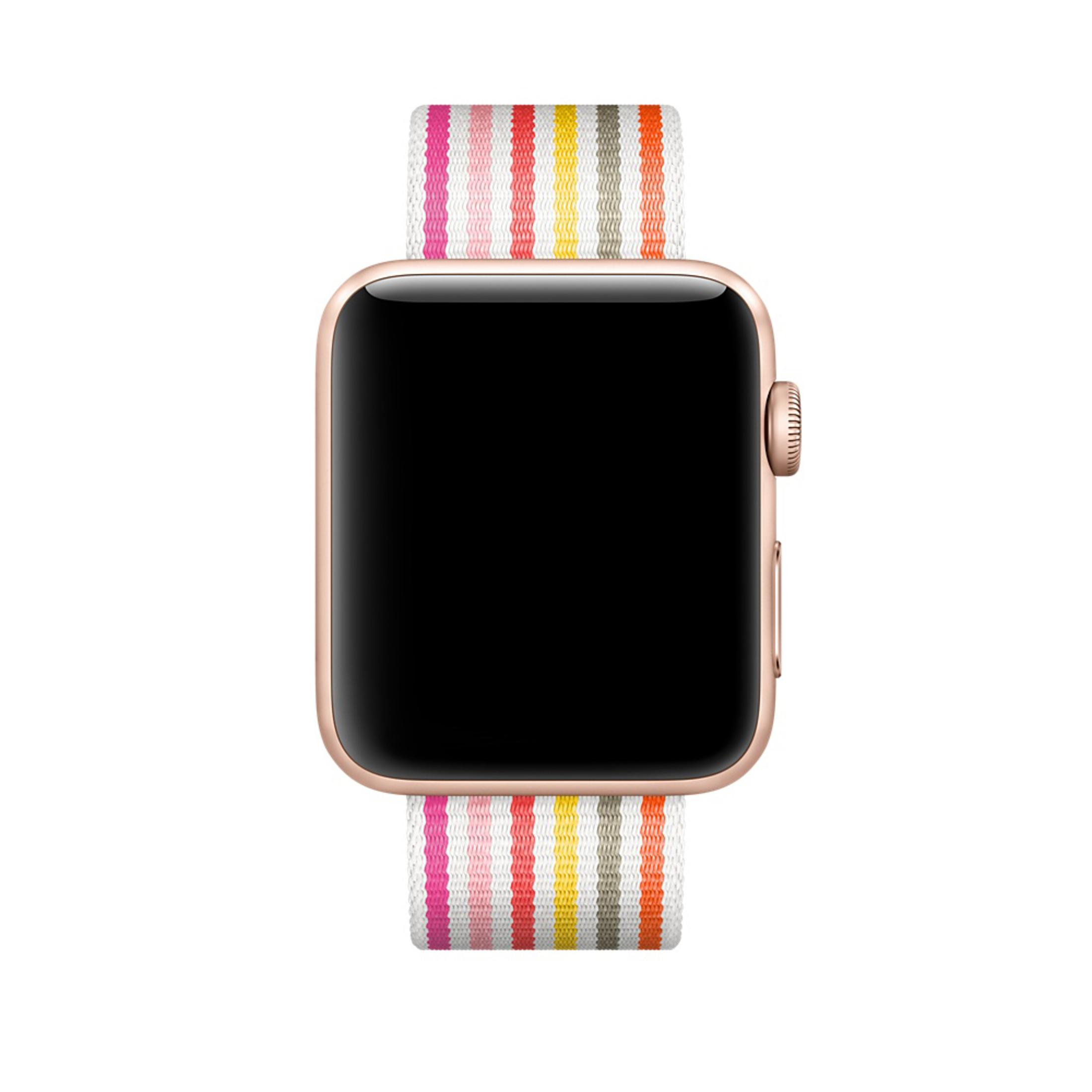 Apple Watch ze złotą kopertą i kolorowym paskiem w paski.