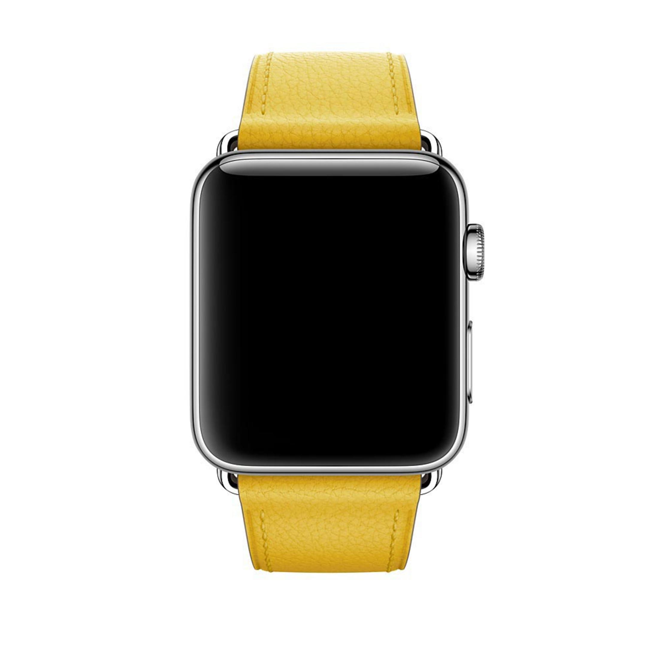 Srebrny Apple Watch z żółtym skórzanym paskiem. Ekran jest czarny.