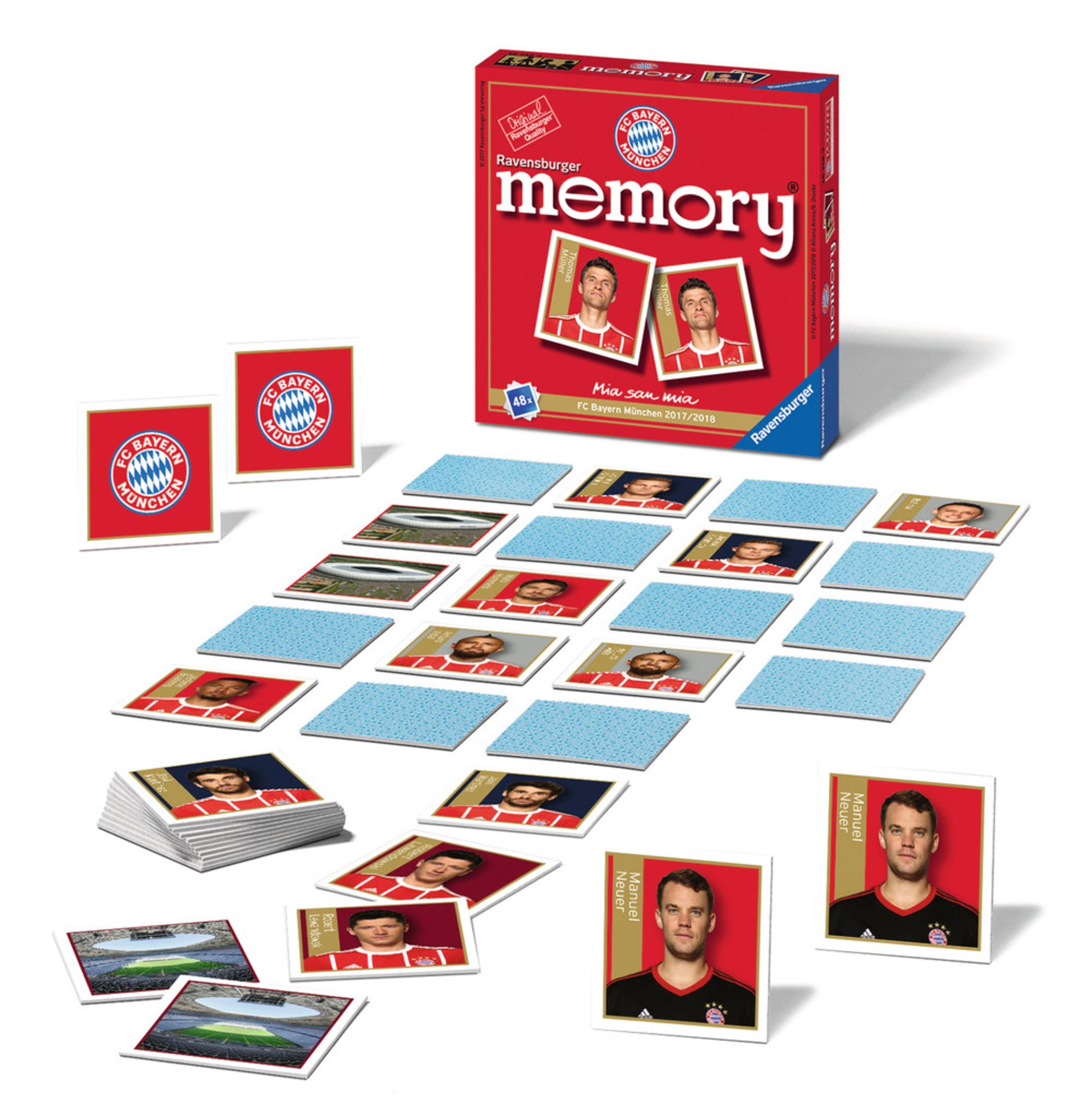 Eine Ravensburger Memory-Spielbox mit Mitgliedern des FC Bayern München. Karten mit Spielerbildern sind verstreut.