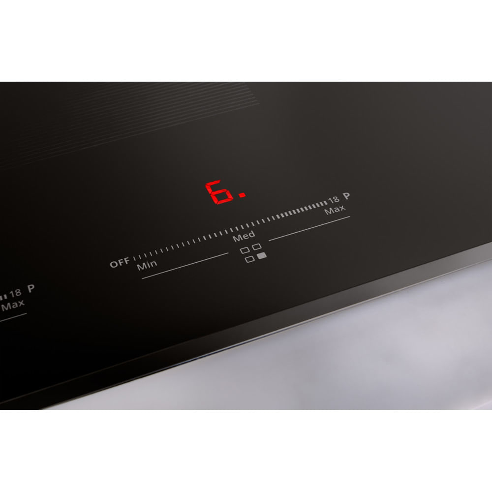 Czarna płyta indukcyjna z czerwonym wyświetlaczem pokazującym liczbę 6.