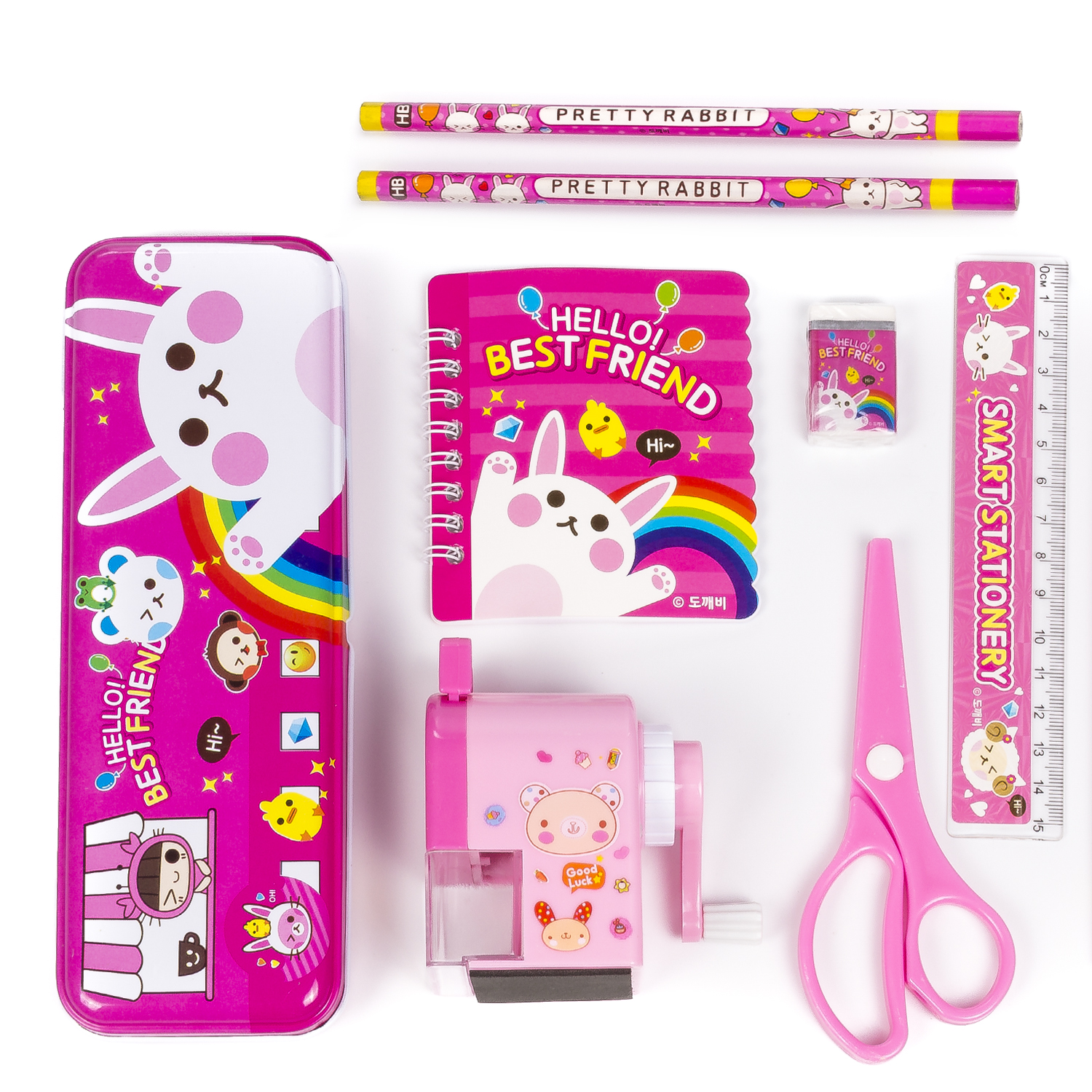 Set de útiles escolares rosas que incluye estuche, lápices, cuaderno, borrador, tijeras y sacapuntas.