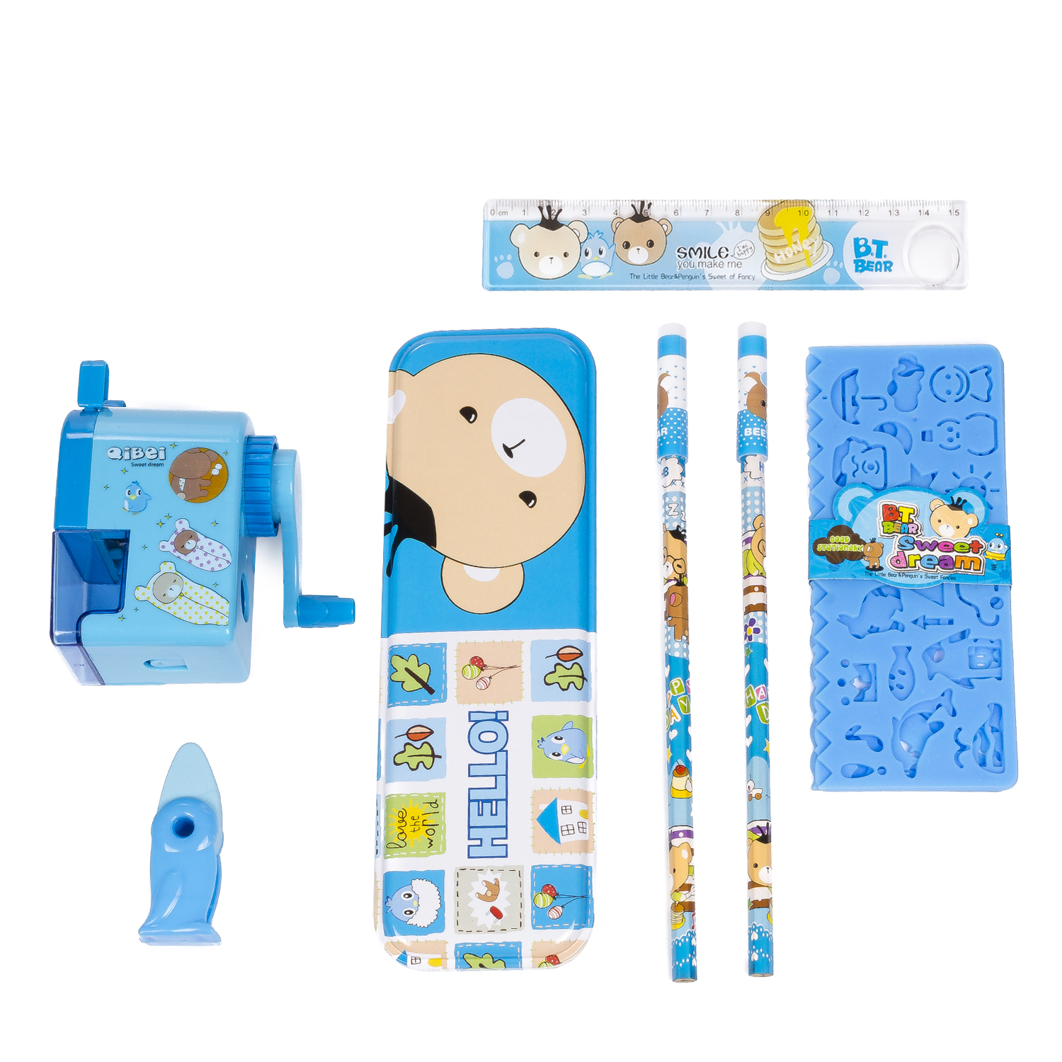Juego de papelería escolar. Sacapuntas, lápices, regla, borrador y plantillas. Fondo blanco.