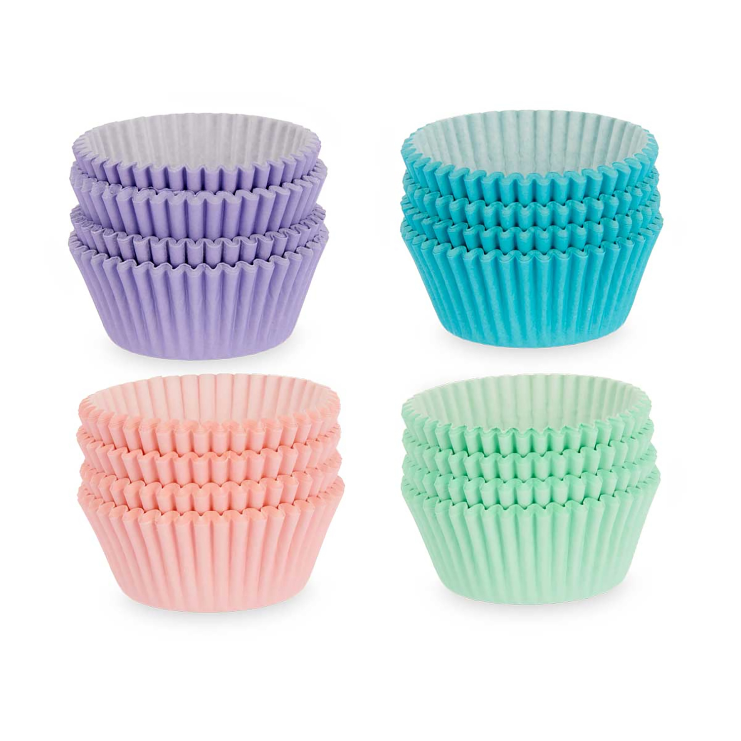 Cuatro pilas de moldes para cupcakes de colores en morado, turquesa, rosa y verde.