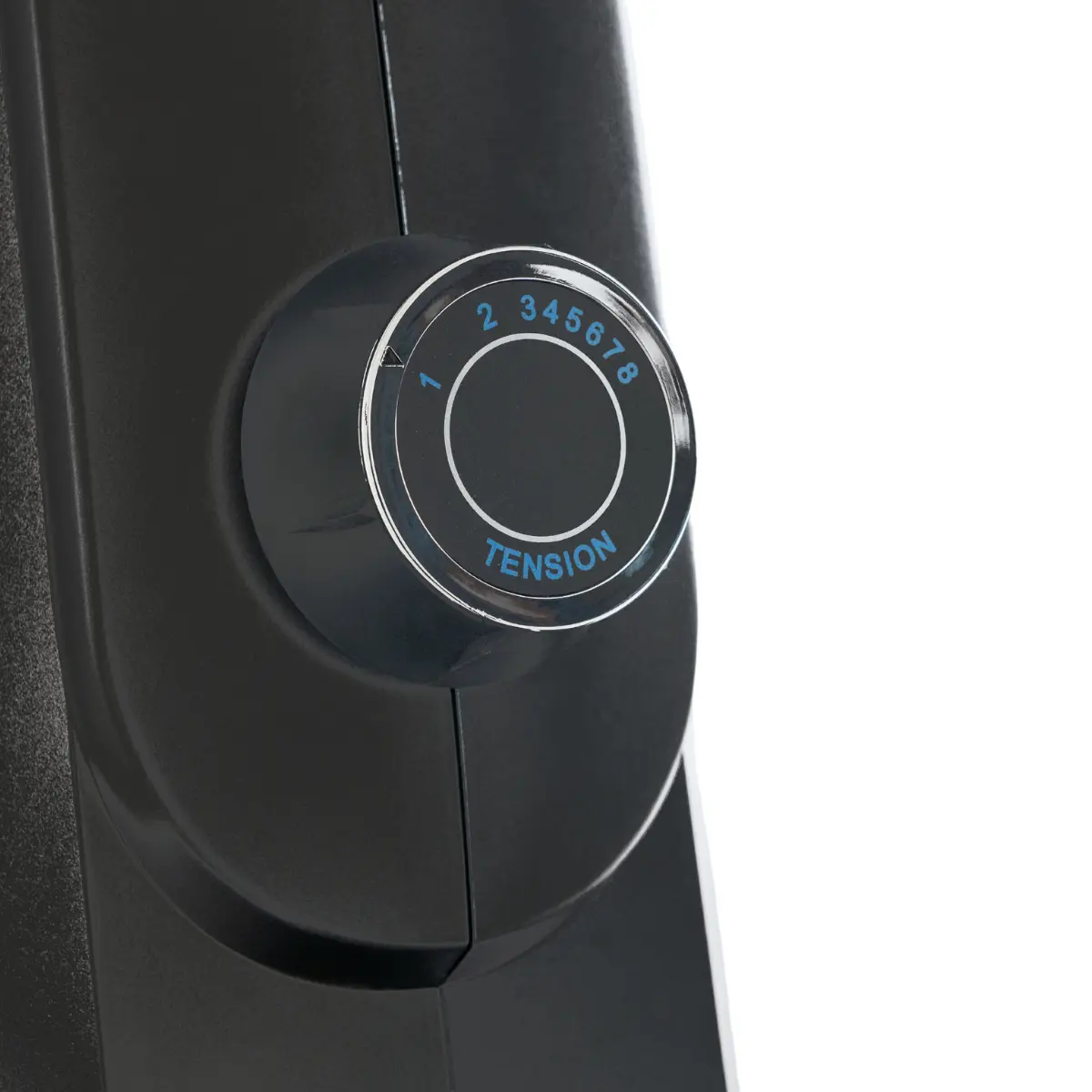 Close up of a black tension dial on an exercise machine. Numbers 1-8 are visible.