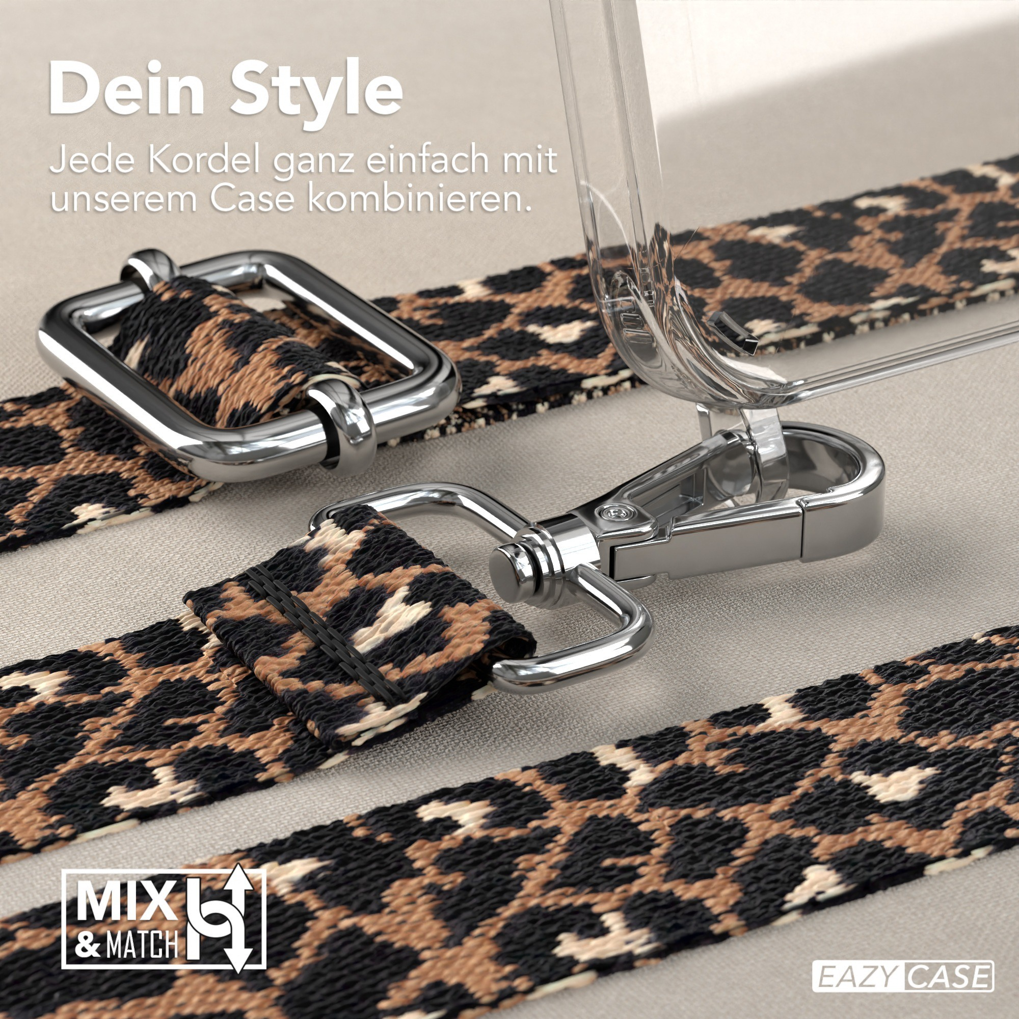 Nahaufnahme einer Handyhülle mit Leopardenmuster-Trageriemen und silberfarbener Hardware. Der Text lautet 'MXL & MATCH'.