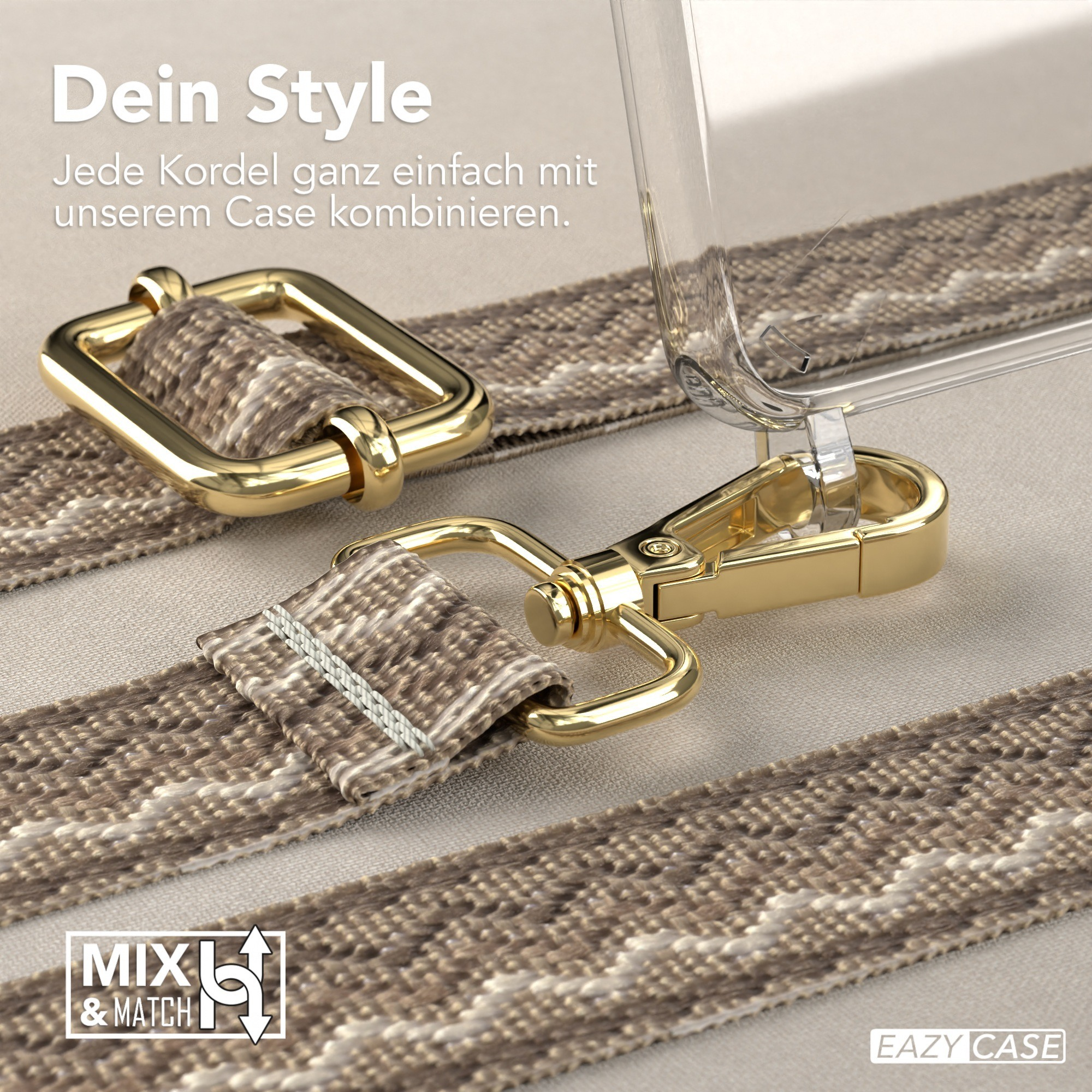 Nahaufnahme eines Handybandes, goldener Verschluss, transparente Handyhülle und Stoffband mit Muster.