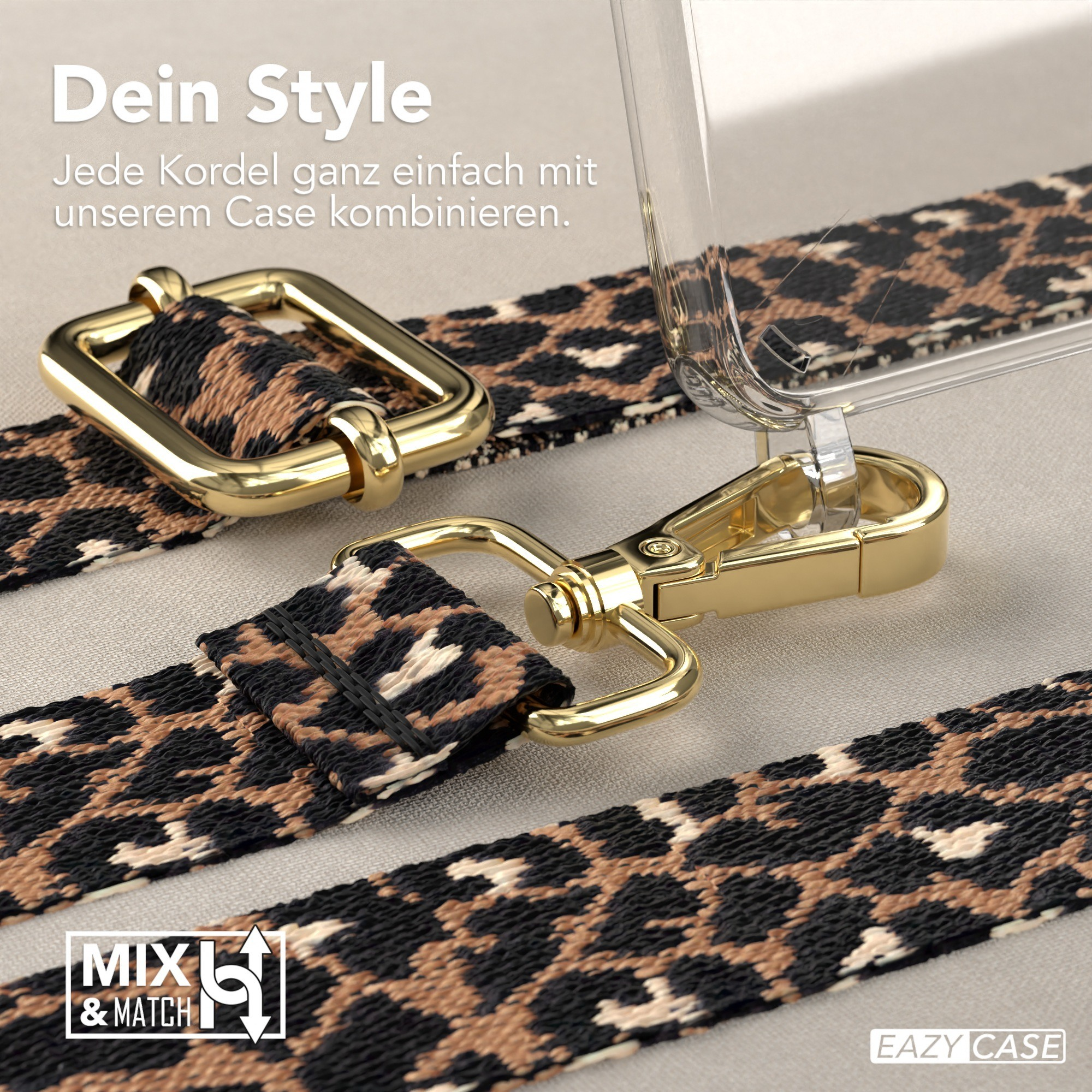 Nahaufnahme einer Handyhülle mit Leopardenmuster-Gurt und goldfarbener Hardware.