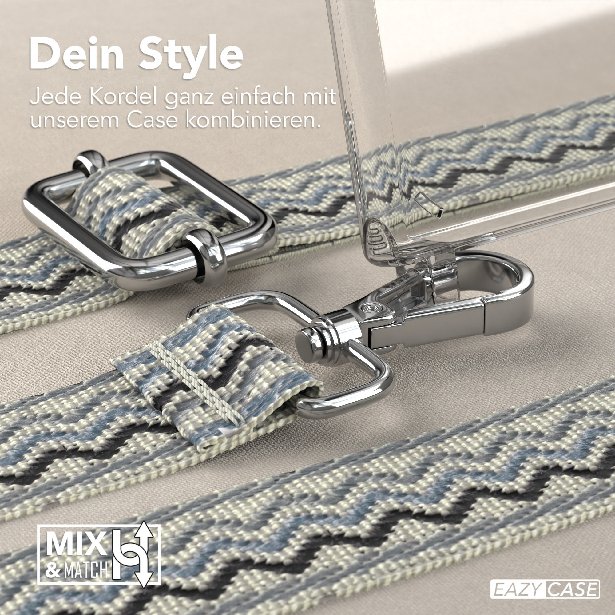 Nahaufnahme von Handyhüllenriemen, silberner Hardware und klarer Handyhülle auf beigem Untergrund. Blau-graues Muster.