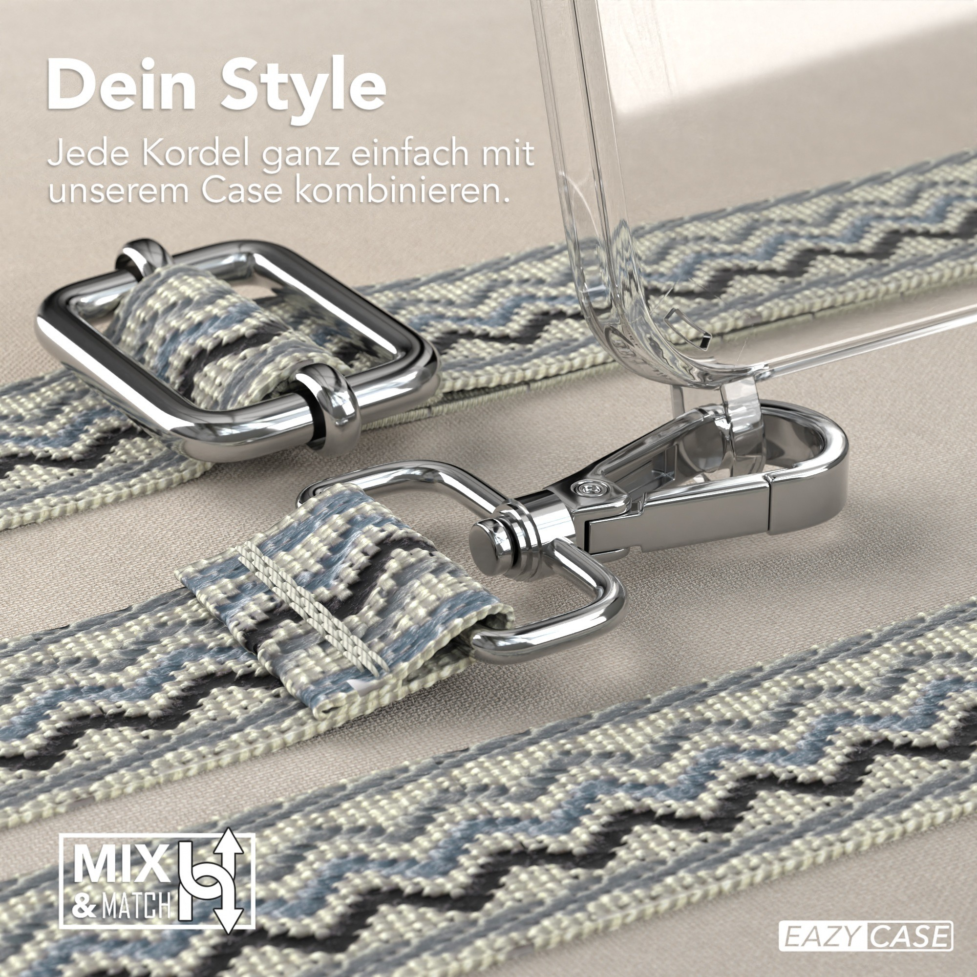 Eine Handyhülle mit gemustertem Riemen, silberfarbener Hardware und einer transparenten Hülle. Der Riemen ist mit der Hülle verbunden.