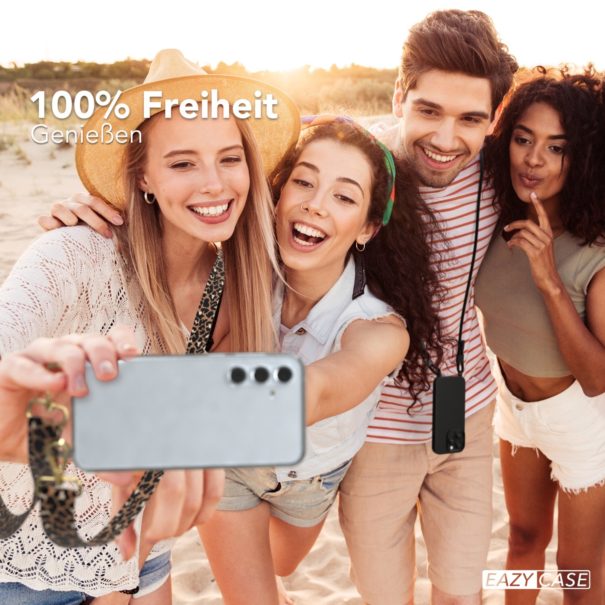 Ein Telefon mit Hülle, das kabellos aufgeladen wird. Eine Kaffeetasse und Dekorationen sind in der Nähe. Weißer Hintergrund.