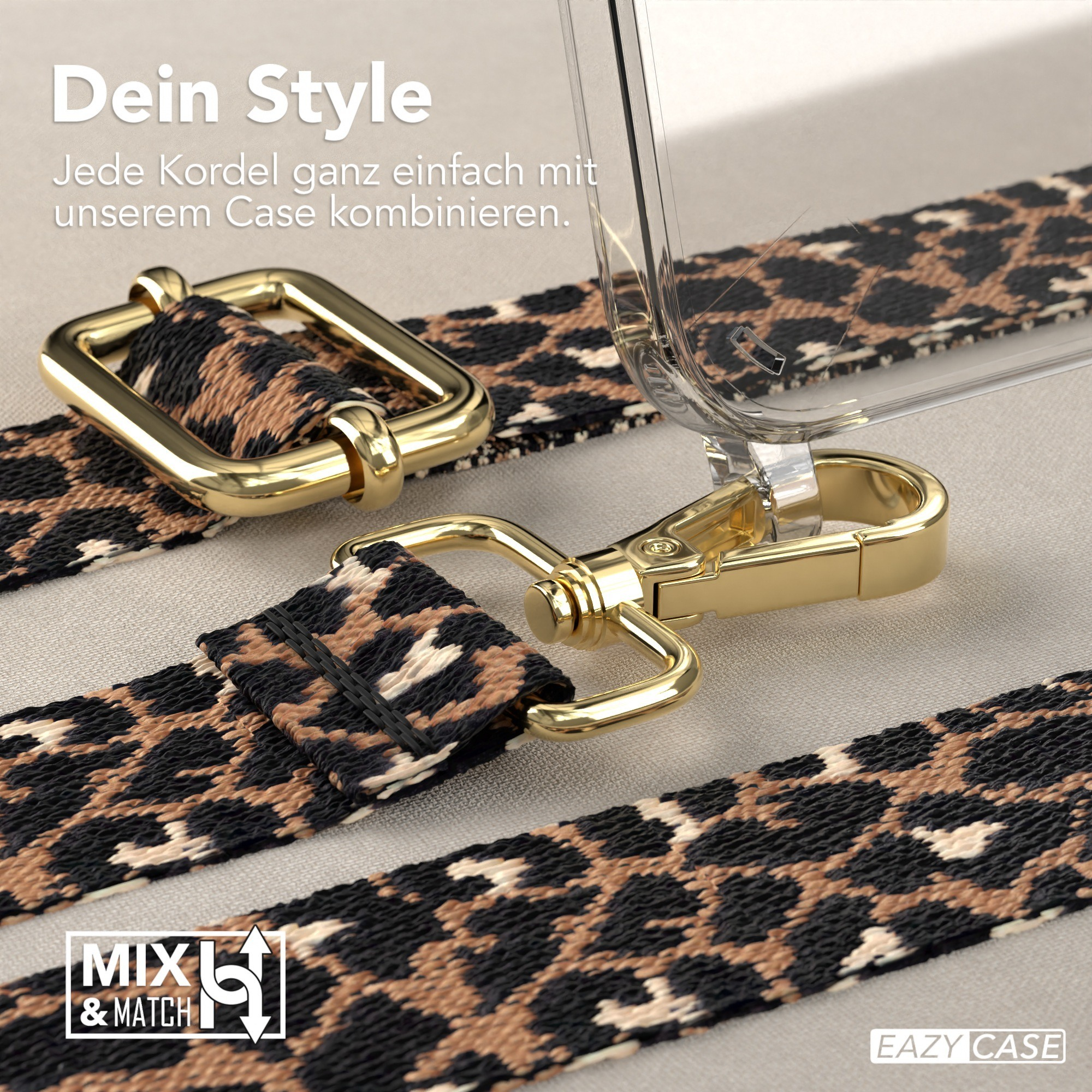 Nahaufnahme einer Handyhülle mit Leopardenmuster-Gurt. Die Hülle ist transparent mit goldfarbener Hardware.