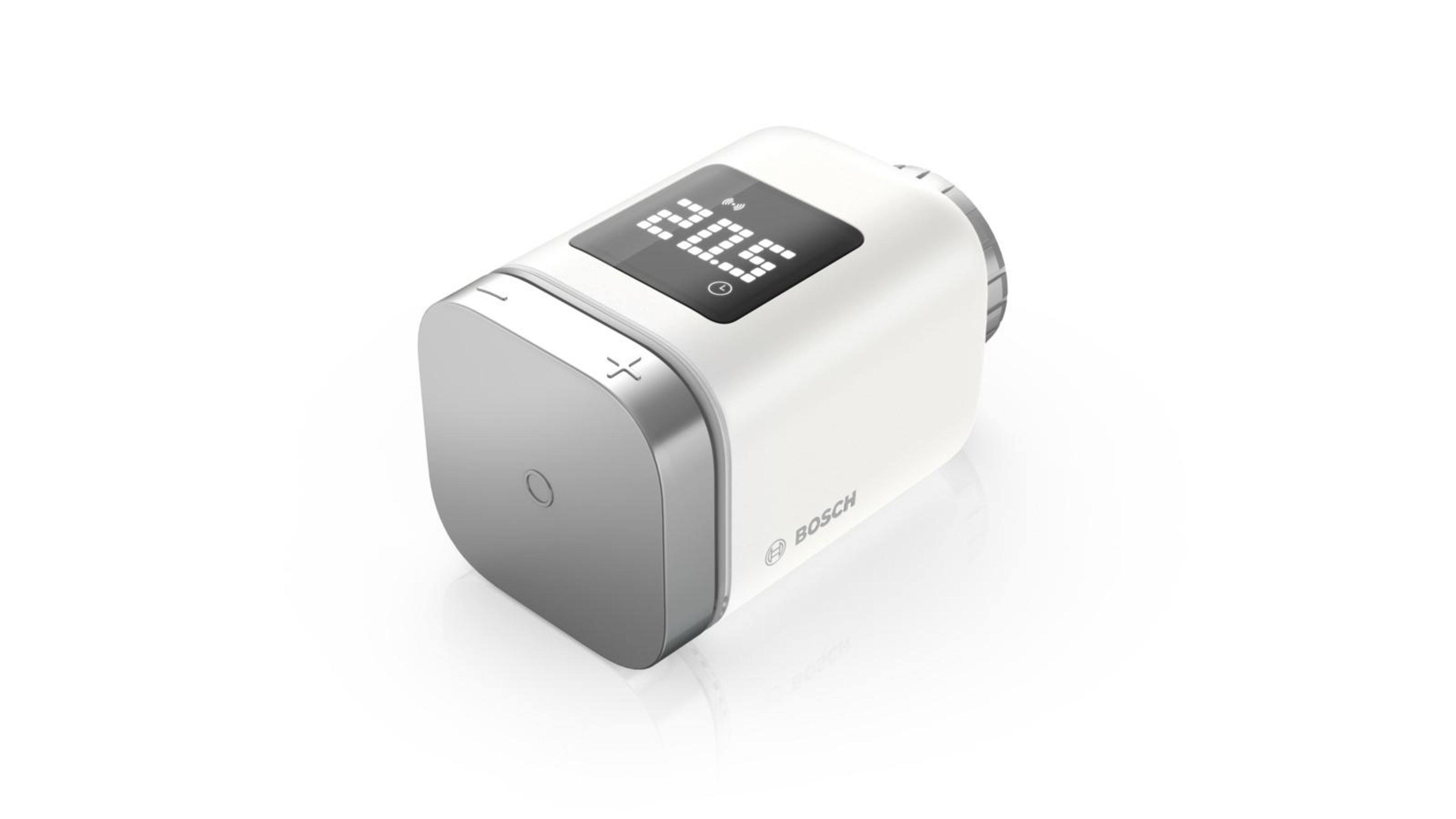 Weiß-silberner Thermostat mit Digitalanzeige, der Markenname ist Bosch.