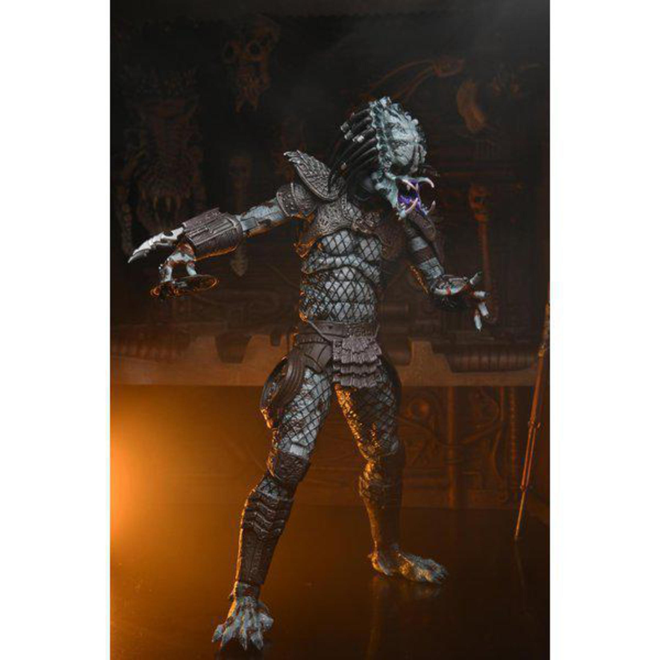 Eine Predator-Actionfigur in Kampfpose, mit sichtbaren Details.