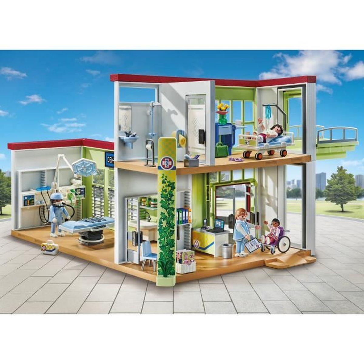 Ospedale giocattolo Playmobil con più stanze e personaggi: medici, pazienti e attrezzature.