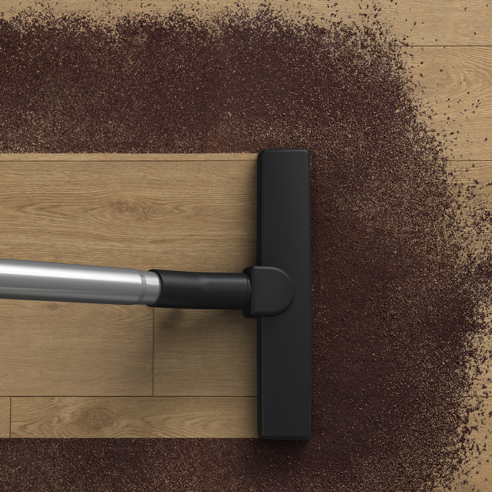 Spazzola dell'aspirapolvere che pulisce il pavimento in legno. Detriti marroni sul pavimento. Testina nera.