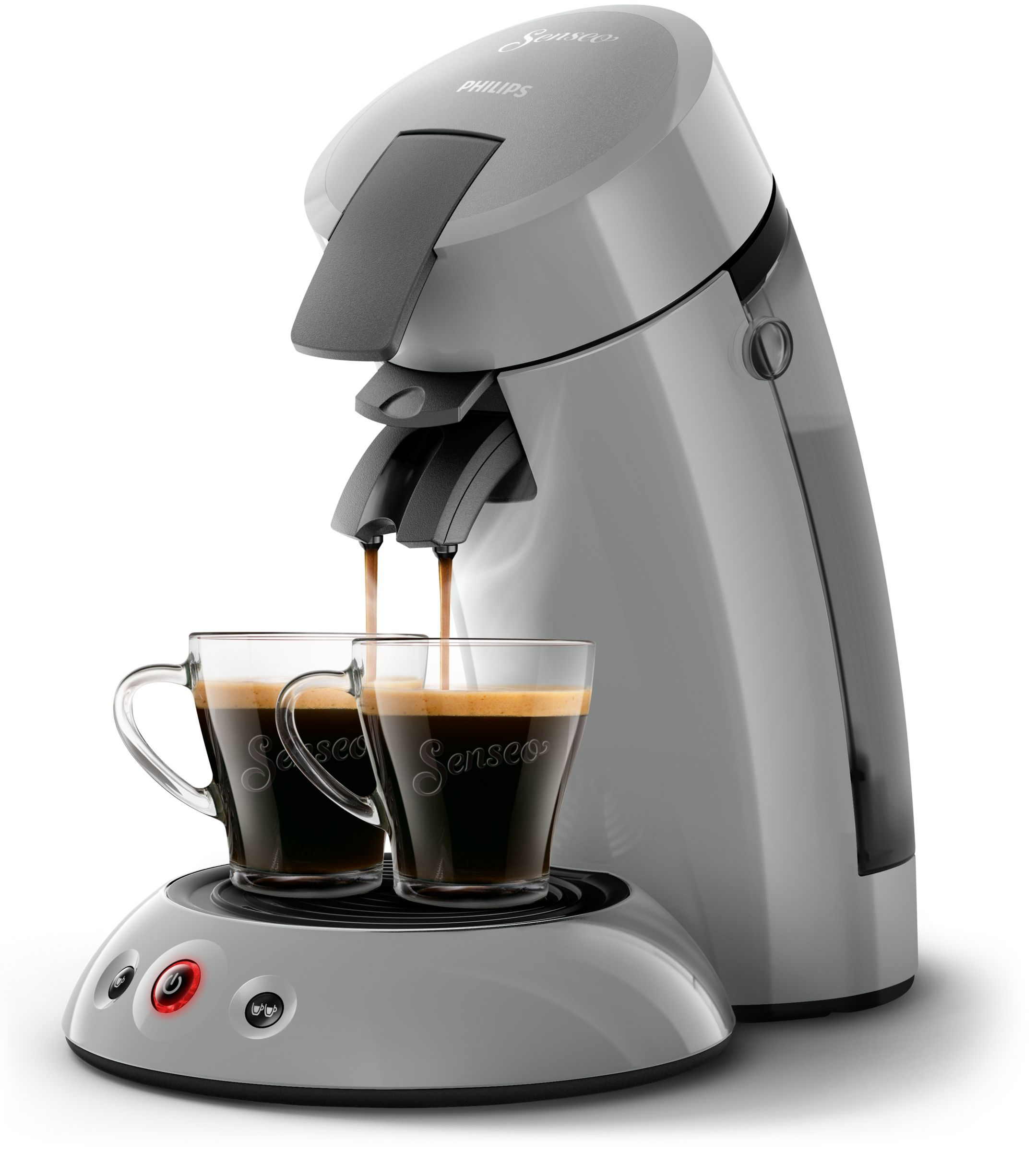 Een grijze koffiemachine met twee heldere glazen bekers gevuld met koffie. Koffie komt uit de machine.