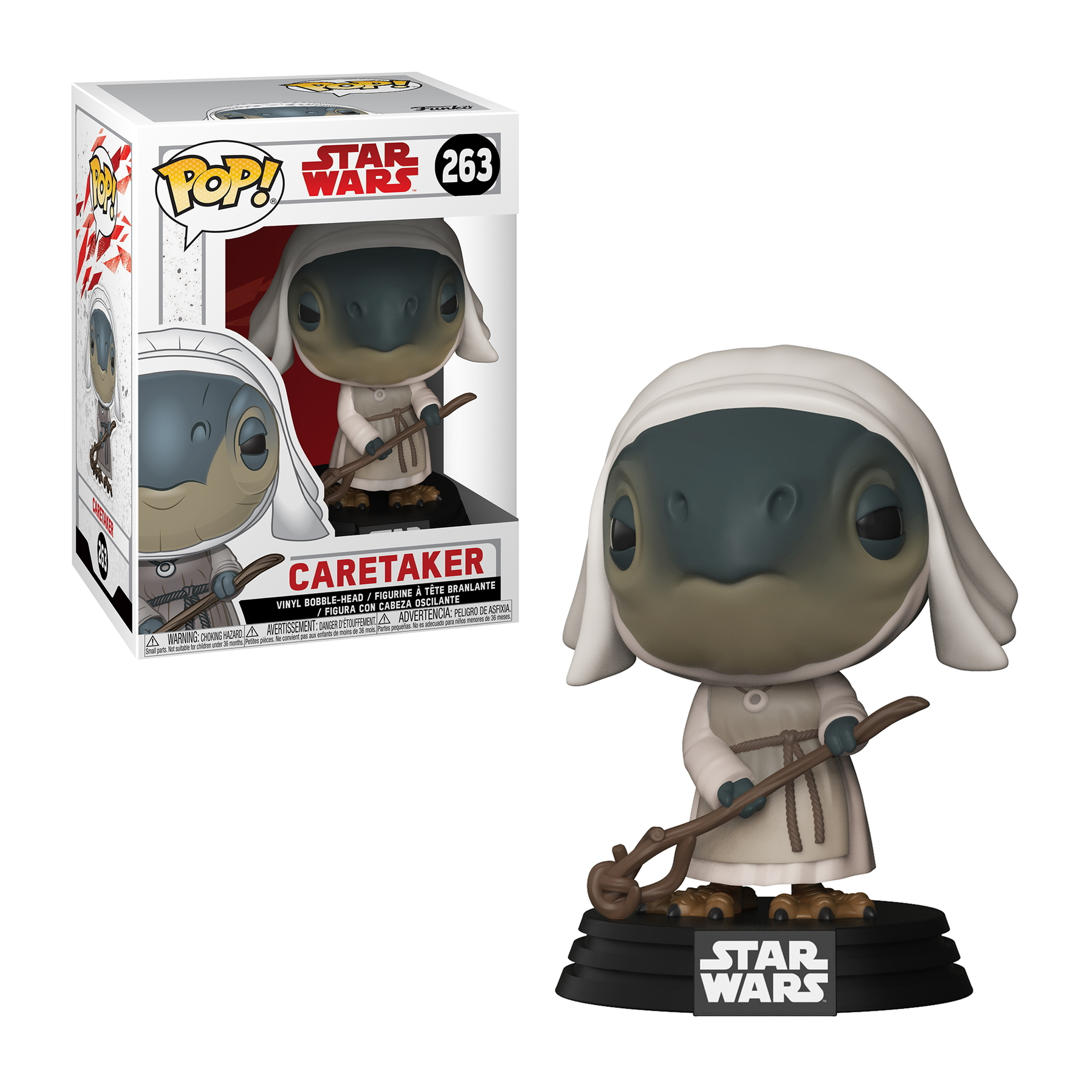 Eine Star Wars-Figur eines Caretakers mit Stab und weißem Gewand, zusammen mit der Verpackung.