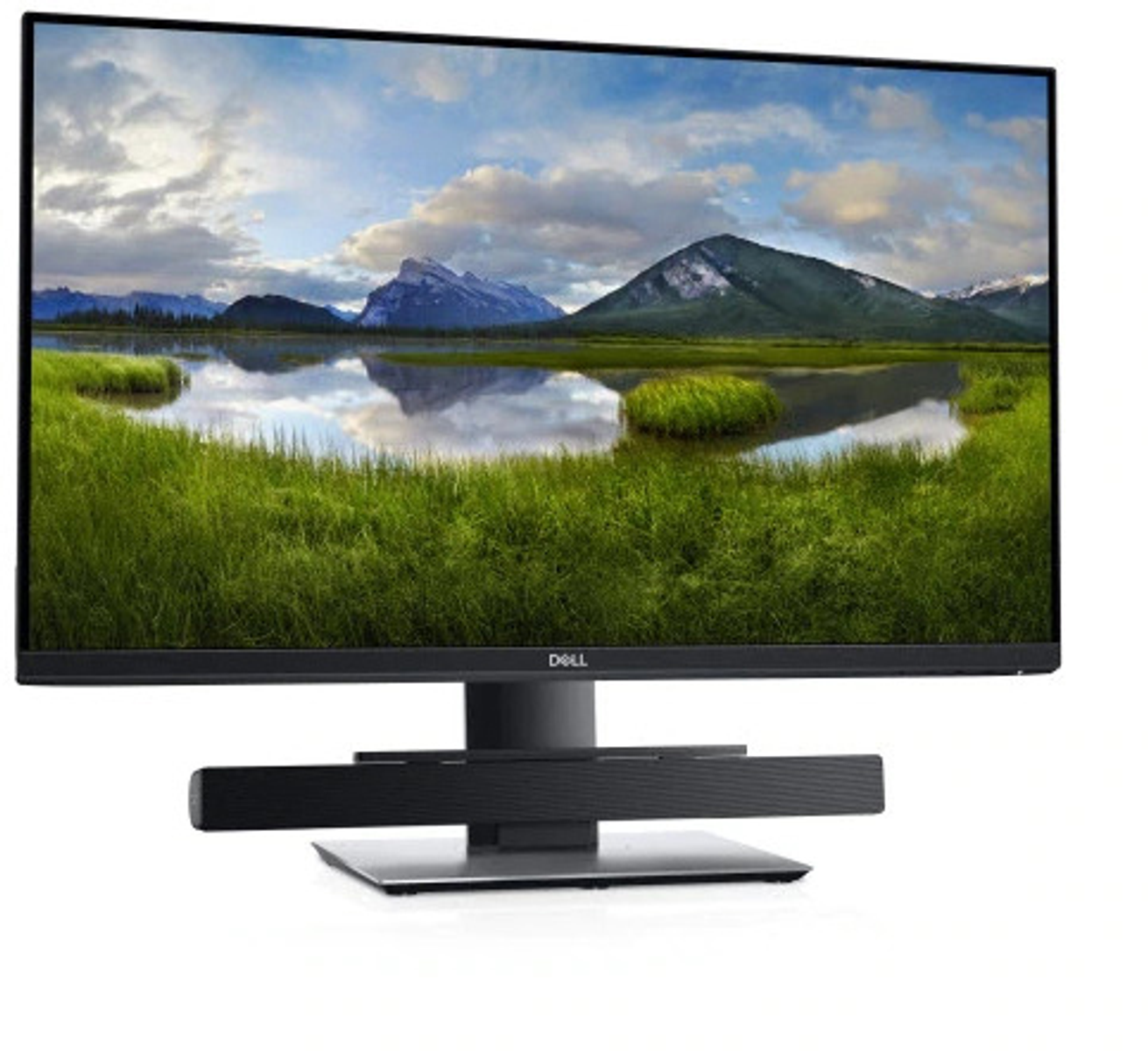 Monitor Dell wyświetlający obraz krajobrazu z górami, wodą i trawą na białym tle.