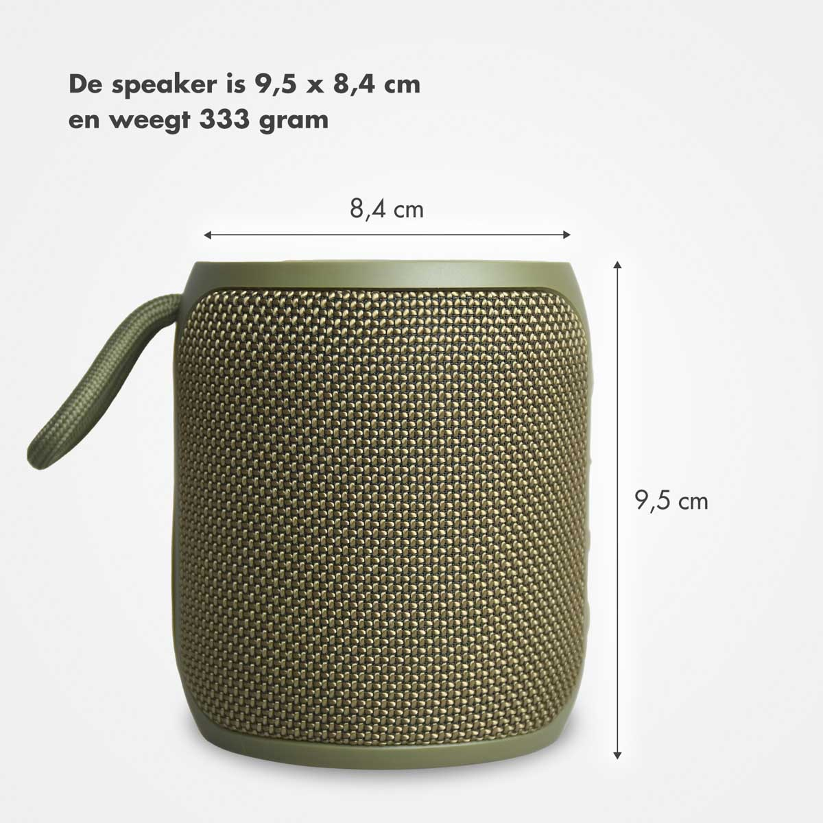 Groene luidspreker. Het is een rechthoekige luidspreker met afmetingen en een handvat.