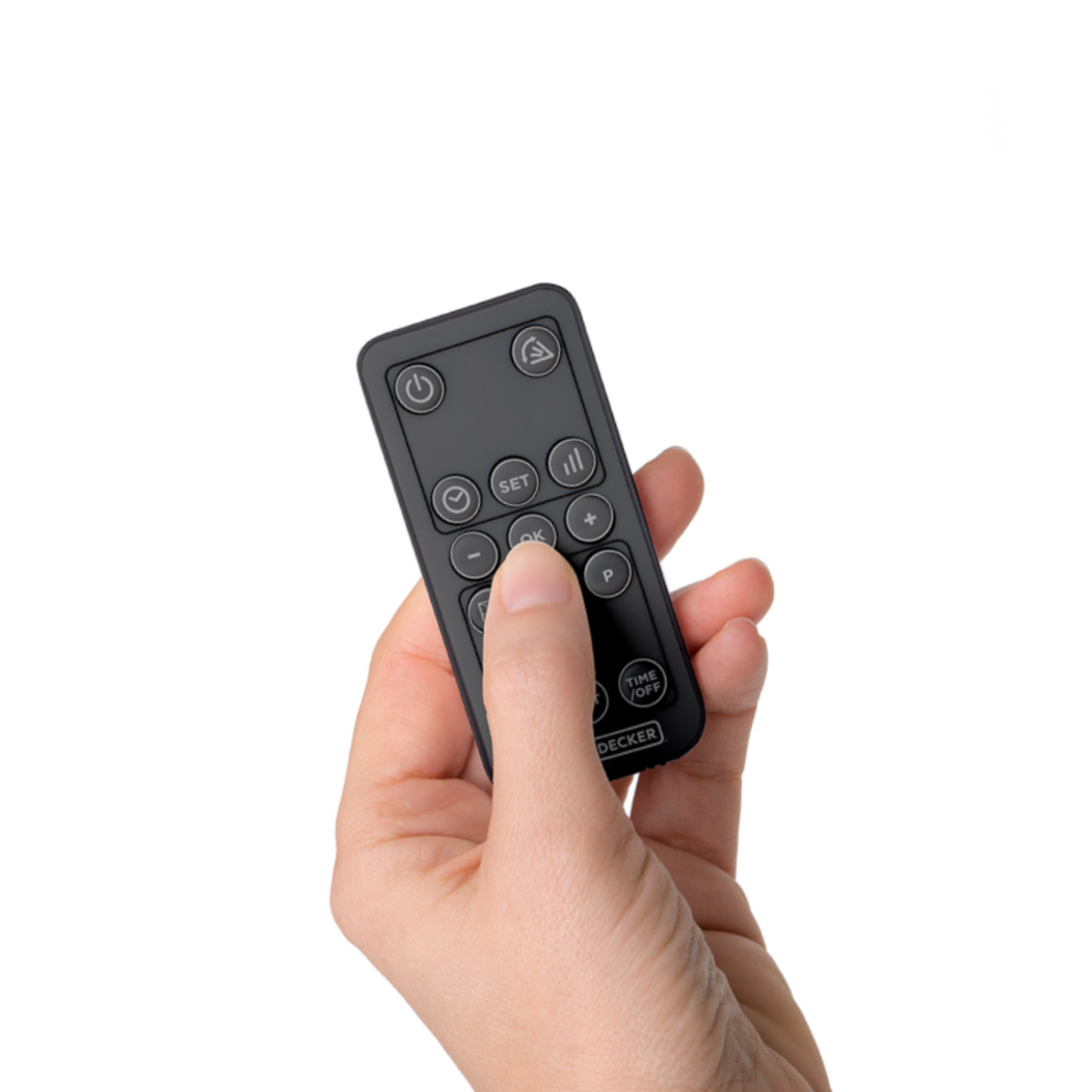 Ręka trzyma czarny pilot. Kilka przycisków widocznych na białym tle.