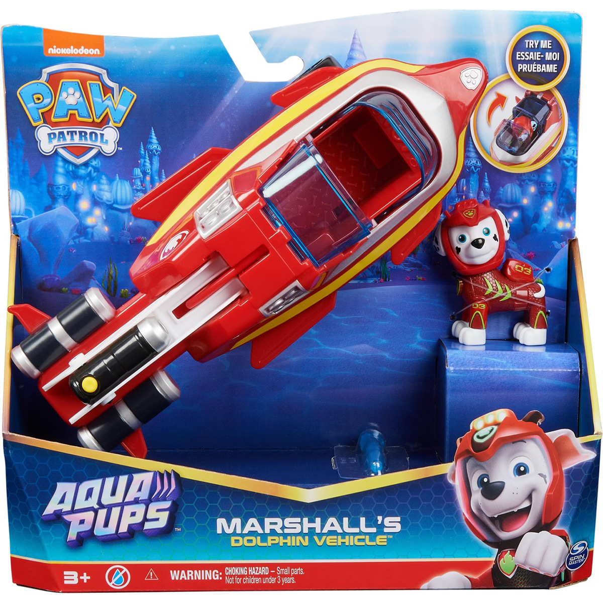 Set di giocattoli Paw Patrol con un veicolo rosso e il personaggio di Marshall, il dalmata. In scatola.