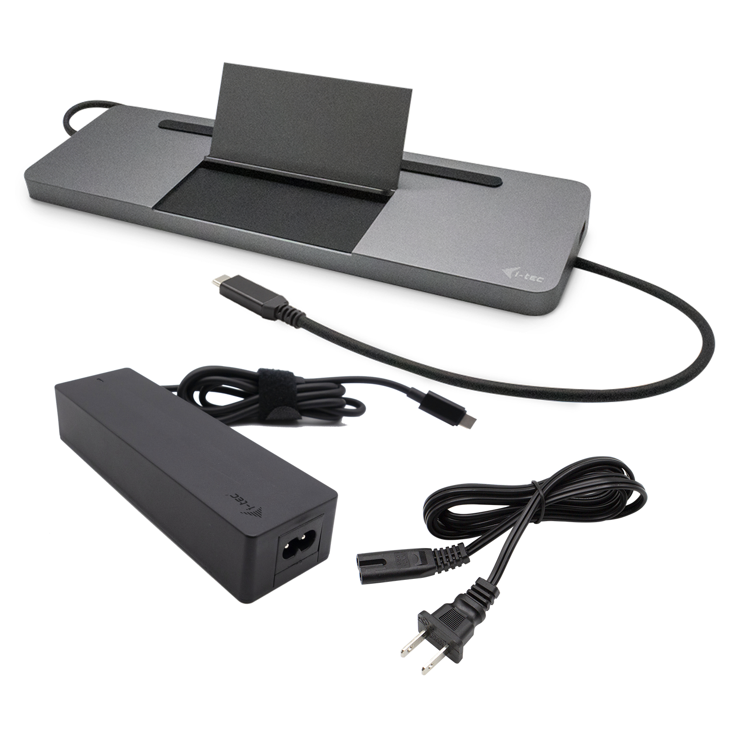 Una docking station grigia con alimentatore nero e cavo USB-C.