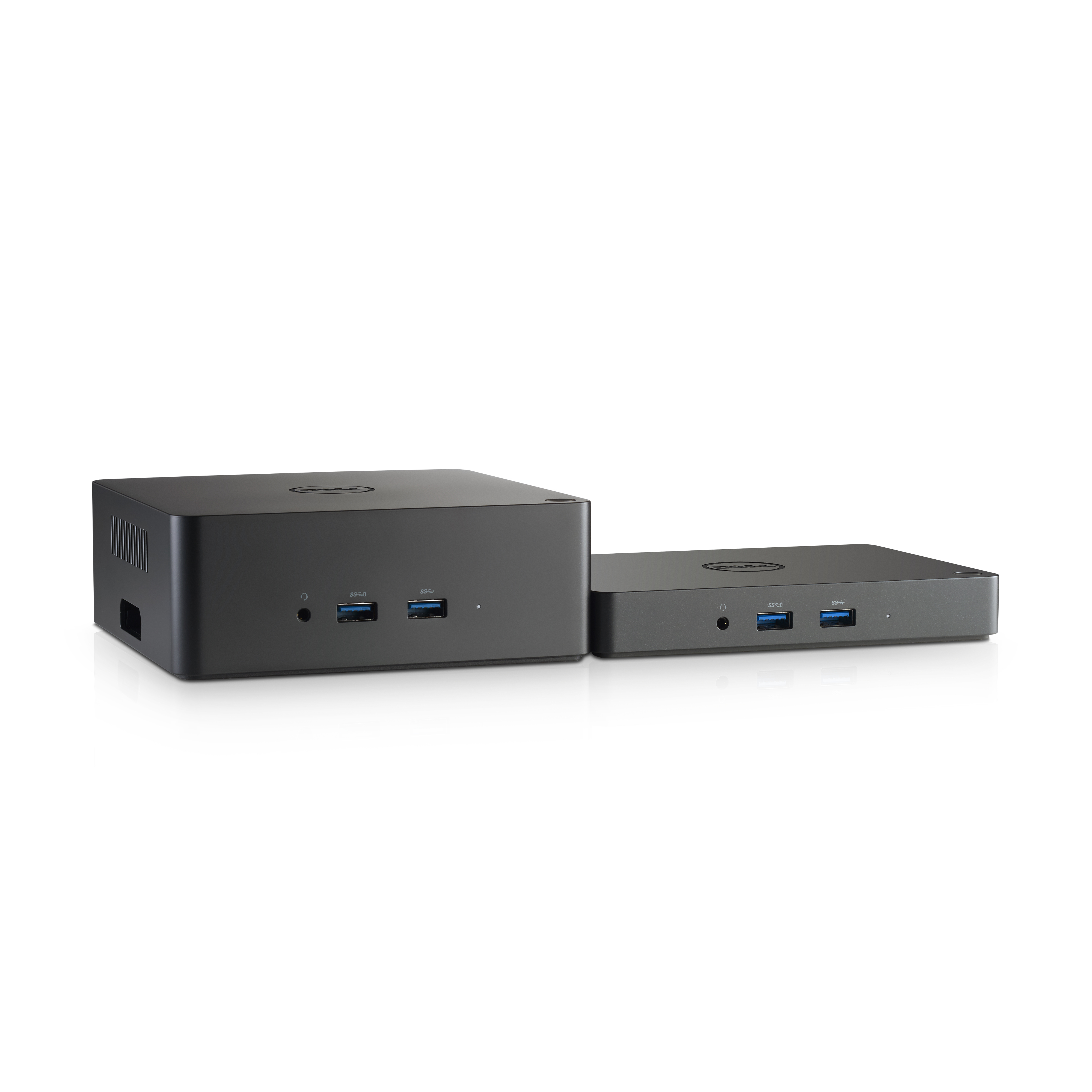 Due dispositivi neri, uno rettangolare, uno quadrato, uno accanto all'altro. Entrambi hanno porte USB.