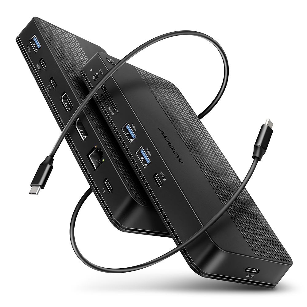 Hub nero con più porte, due cavi USB-C collegati e superficie testurizzata.