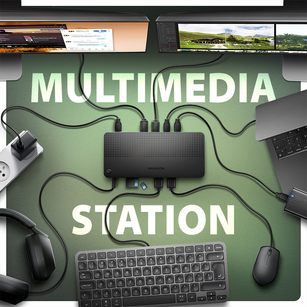 Configurazione della stazione multimediale con hub, laptop, tastiera, mouse e più schermi.