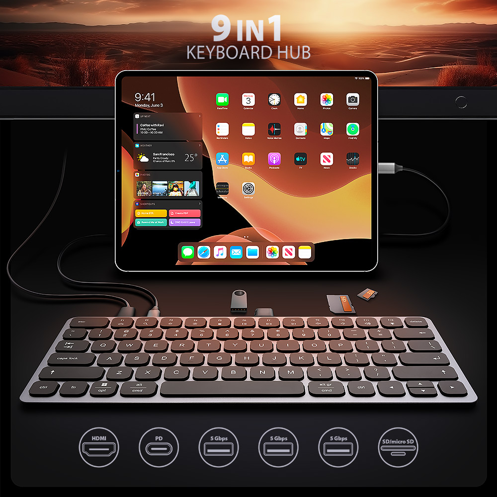 Un tablet è collegato a un hub tastiera. Lo schermo mostra le app e la tastiera ha una finitura argentata.