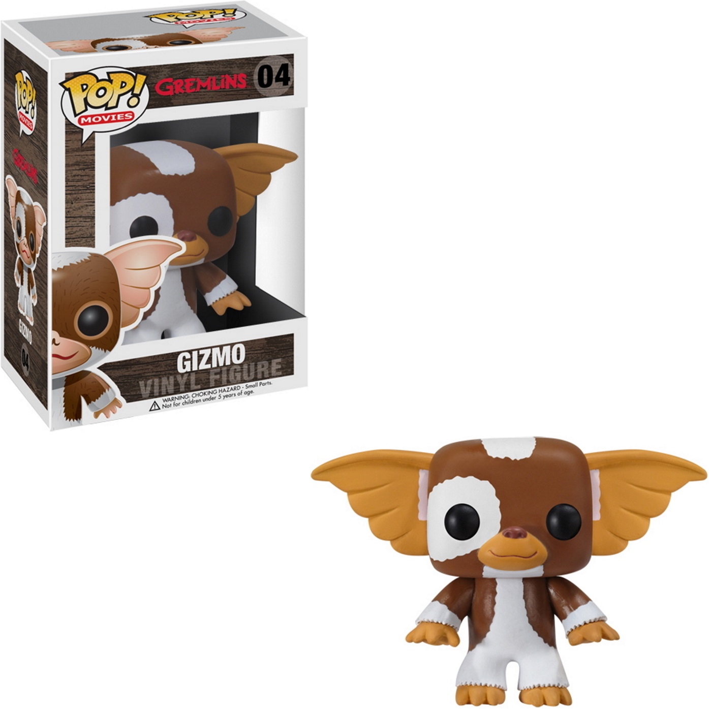 Gizmo-Vinylfigur mit Schachtel. Die Figur ist braun und weiß mit großen Ohren, und die Schachtel hat ein Bild davon.