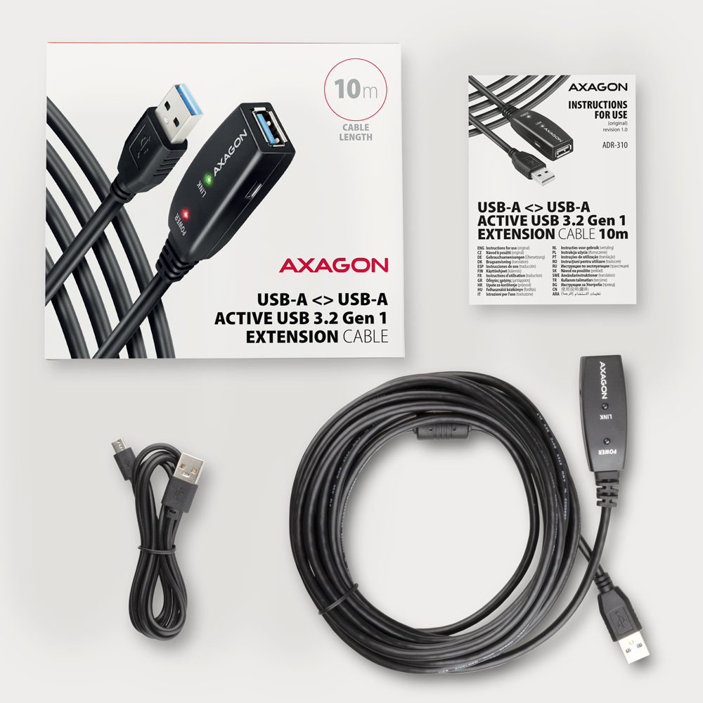 Una scatola con cavo di prolunga USB e cavo arrotolato, più istruzioni e cavo.