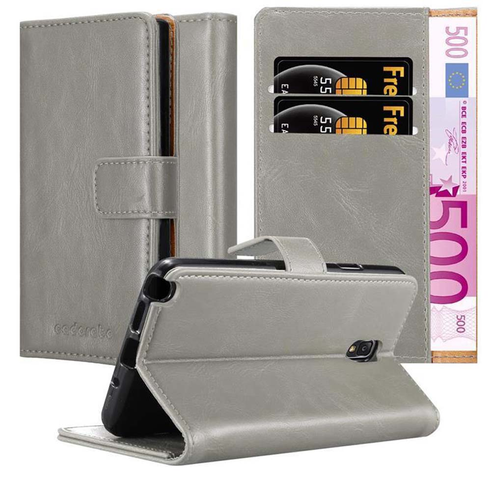 Funda gris para teléfono con teléfono dentro. Abierta, con ranuras para tarjetas y efectivo.