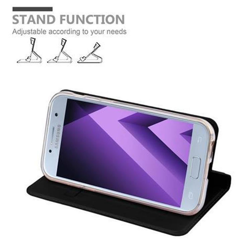Teléfono en funda negra, apoyado para función de soporte, sobre fondo blanco.
