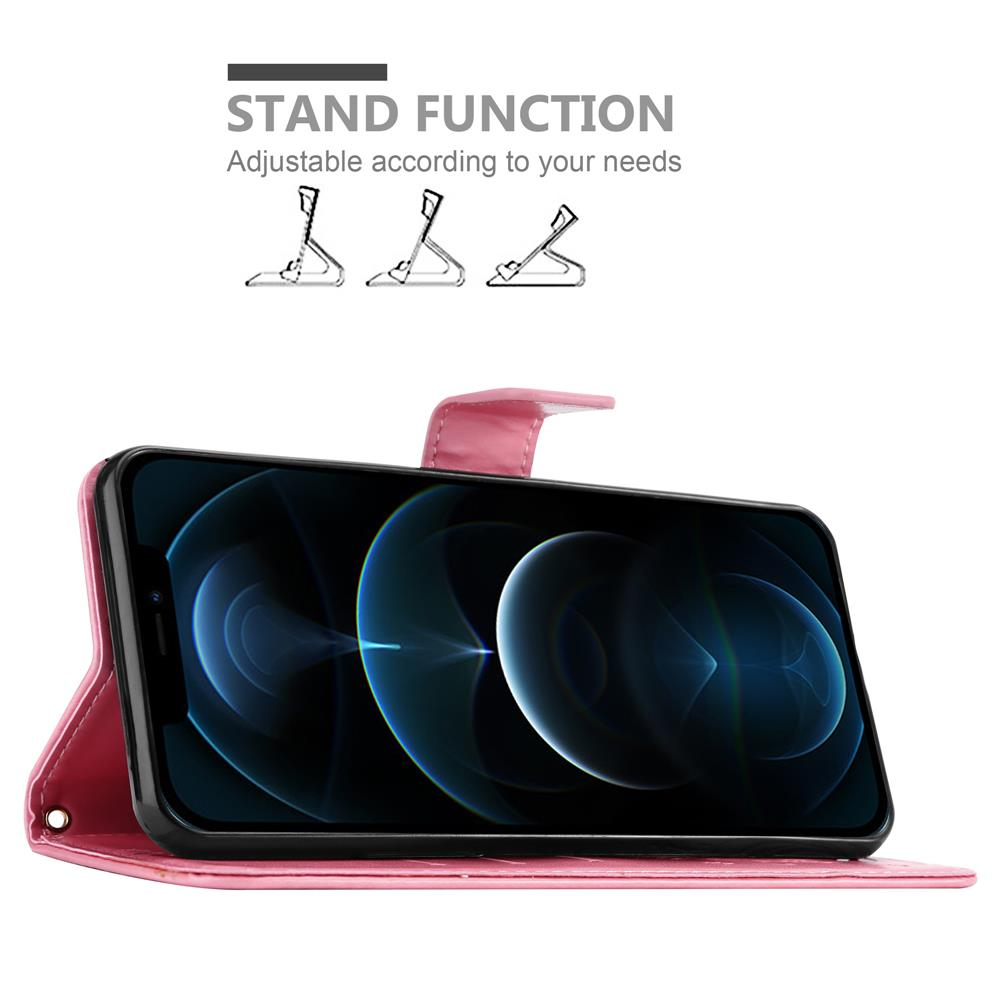 Custodia rosa per telefono con telefono all'interno e funzione supporto. La custodia è aperta.