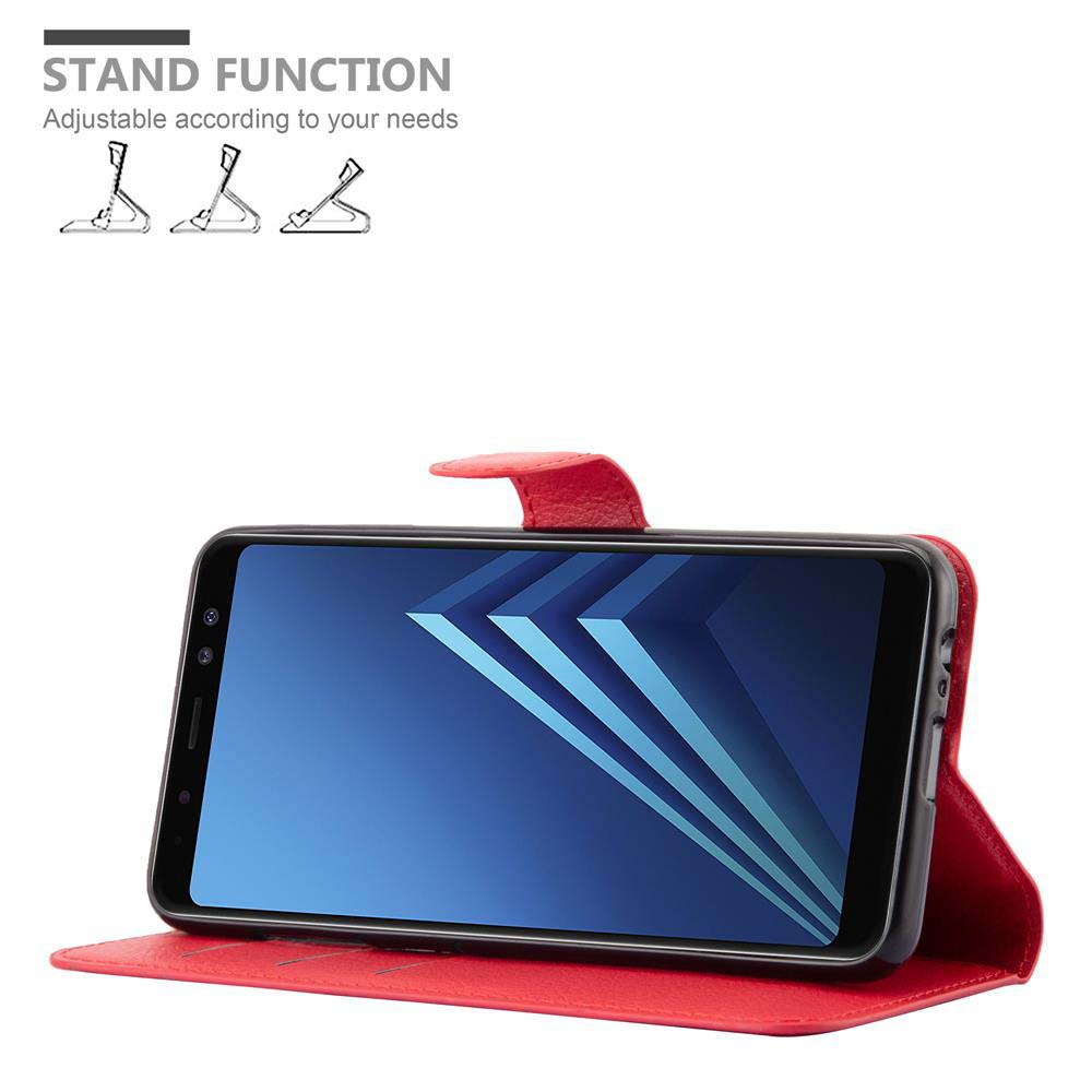 Una custodia per telefono rossa aperta, con un telefono che mostra uno schermo blu.