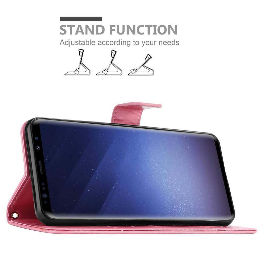 Un telefono in una custodia rosa. La custodia è in funzione stand. Ci sono diagrammi che mostrano la funzione stand.