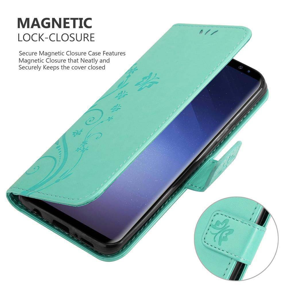 Custodia del telefono verde acqua, aperta, che mostra il telefono all'interno. Design floreale sulla cover, sfondo bianco.