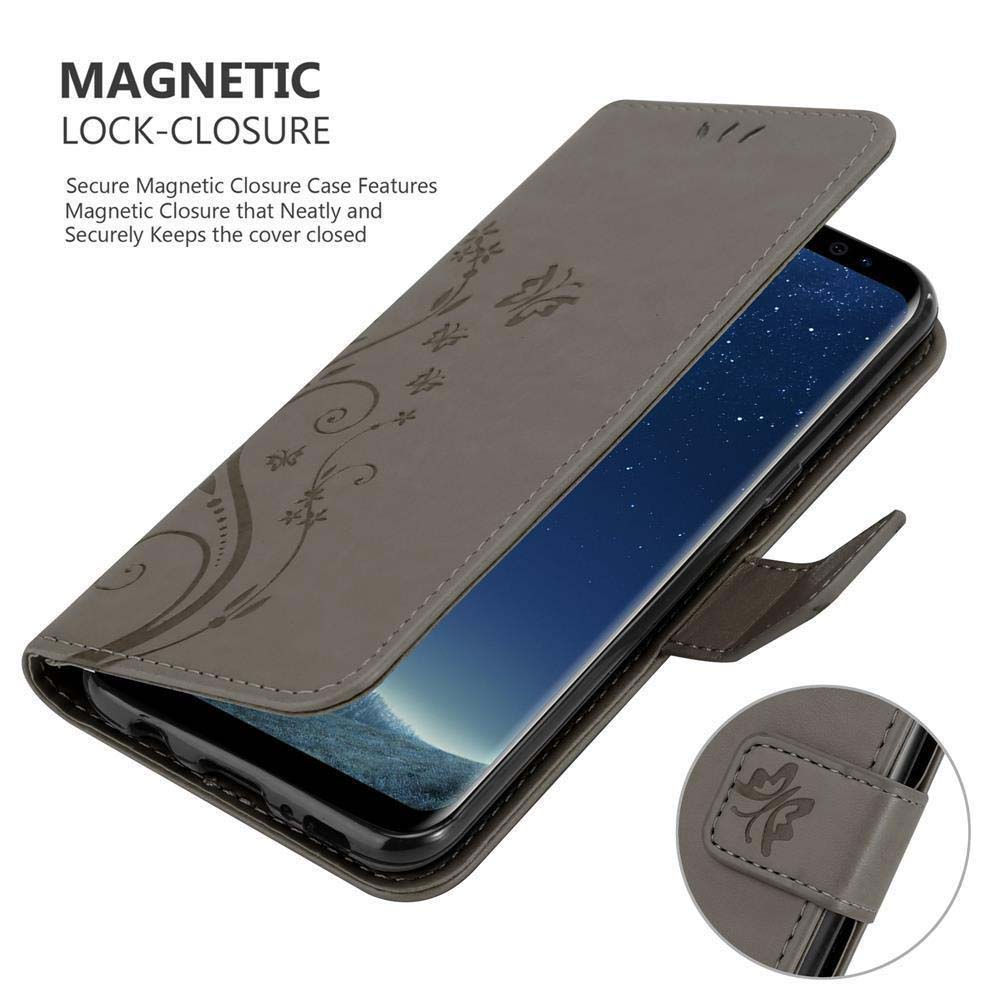 Una custodia per telefono grigia con design floreale aperta, che rivela un telefono scuro all'interno. Sfondo bianco.