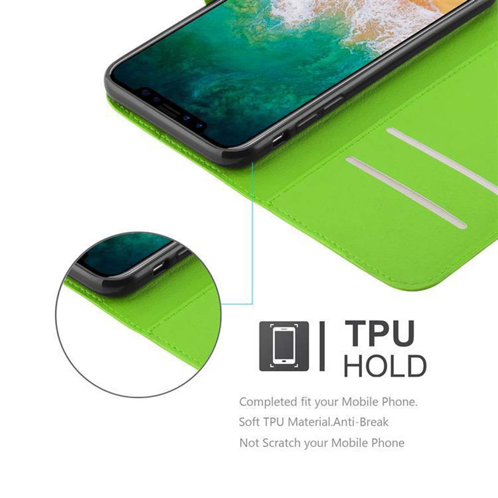 Grüne Handyhülle mit einem Telefon darin. Die Hülle ist geöffnet und zeigt das Telefon und seinen Bildschirm.