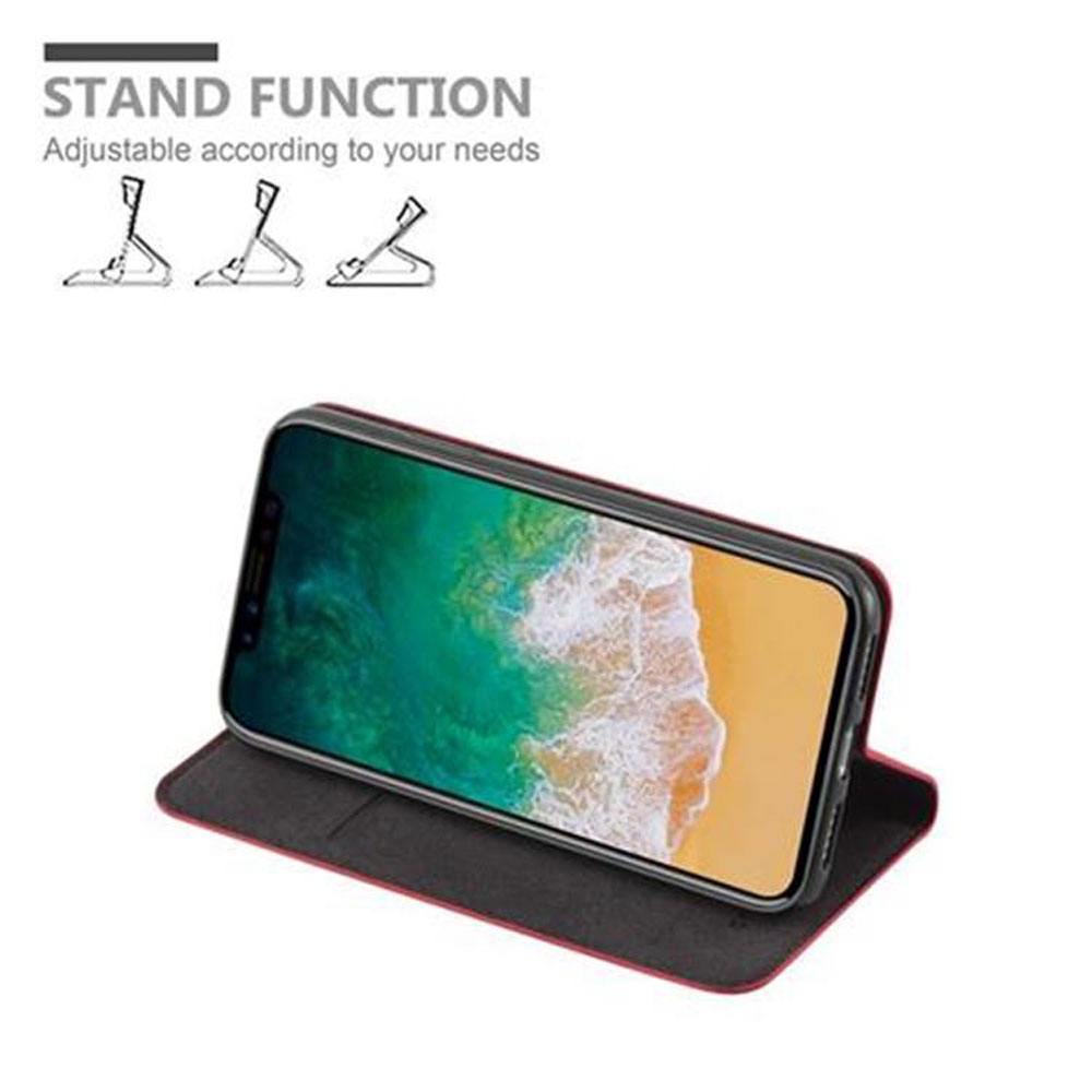 Telefon in Hülle steht auf Ständer. Hülle ist schwarz und rot. Text sagt: Standfunktion.