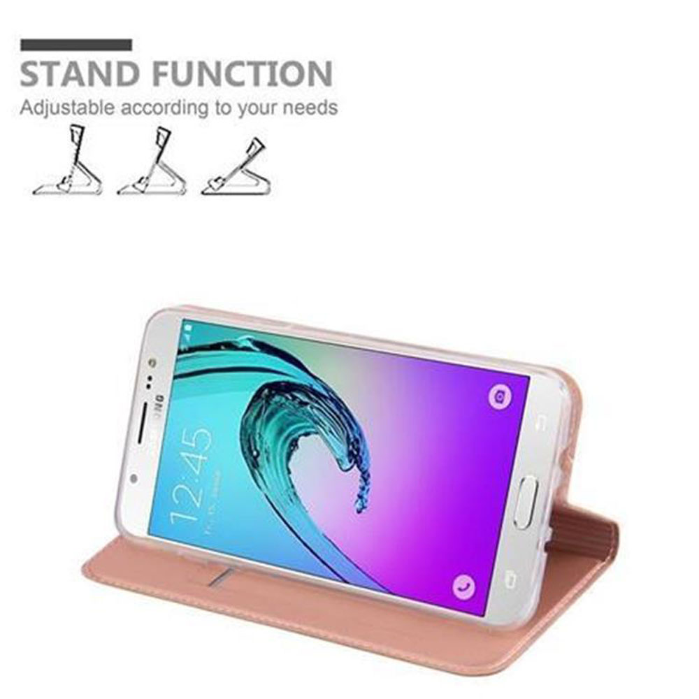 Telefono in una custodia rosa, aperto per mostrare la funzione supporto. Telefono bianco con custodia rosa.