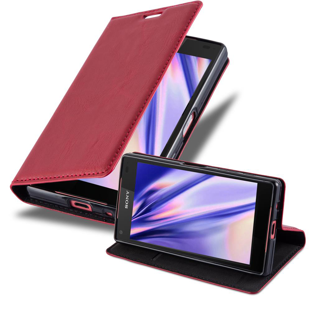 Custodia rossa per telefono con un telefono all'interno. Il coperchio è aperto. Lo schermo del telefono è visibile.
