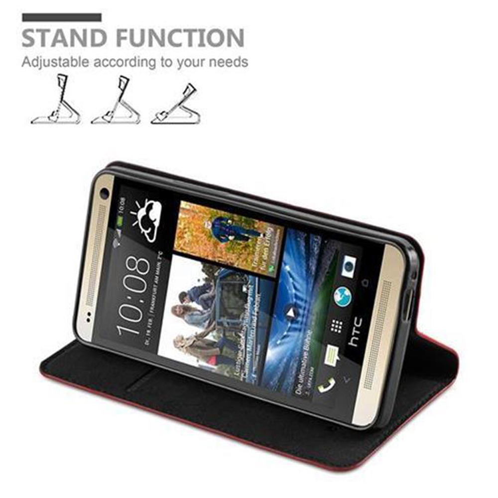 Teléfono en una funda, abierto con soporte. El teléfono muestra una pantalla con texto e imágenes.