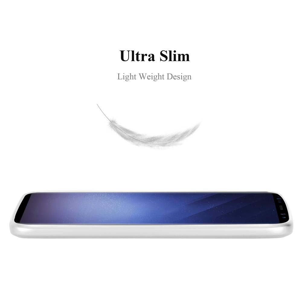 Un telefono su una superficie, un design ultrasottile con una grafica a piuma.