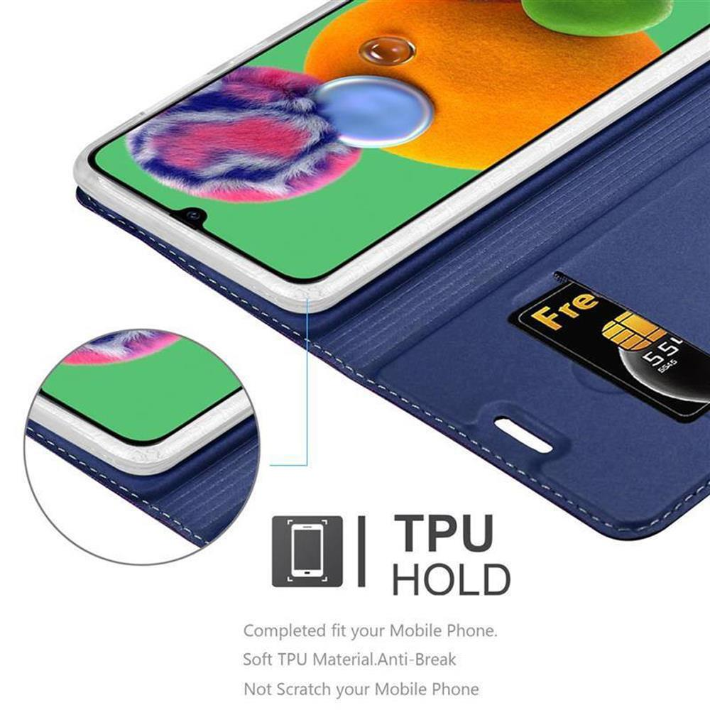 Telefono in custodia blu, con SIM visibile. La custodia è progettata per una buona vestibilità.