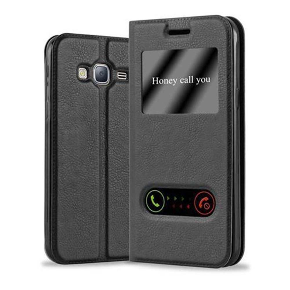 Una funda negra para teléfono con tapa. 'Honey call you' escrito al frente.