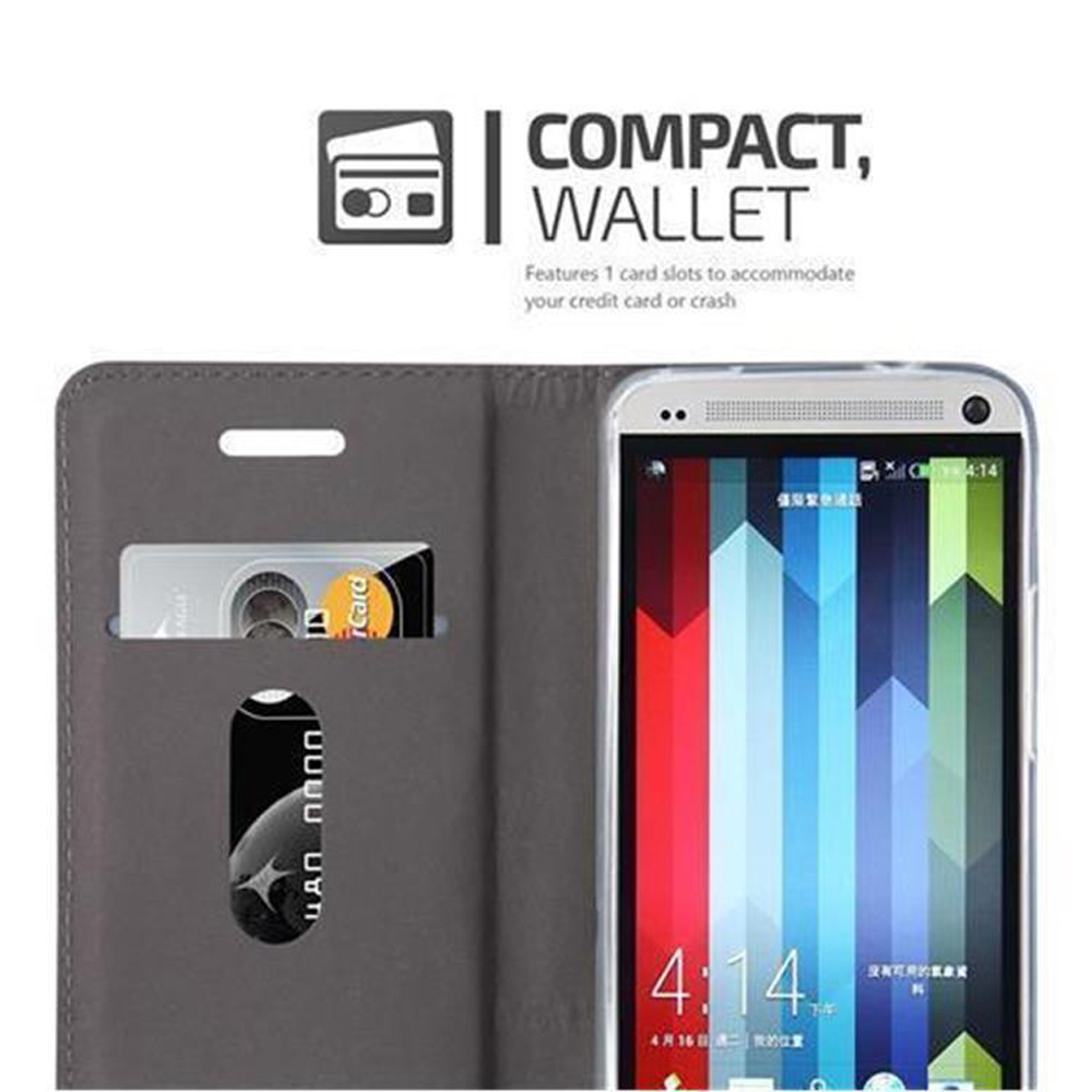 Teléfono en funda tipo cartera gris, mostrando ranuras y pantalla.